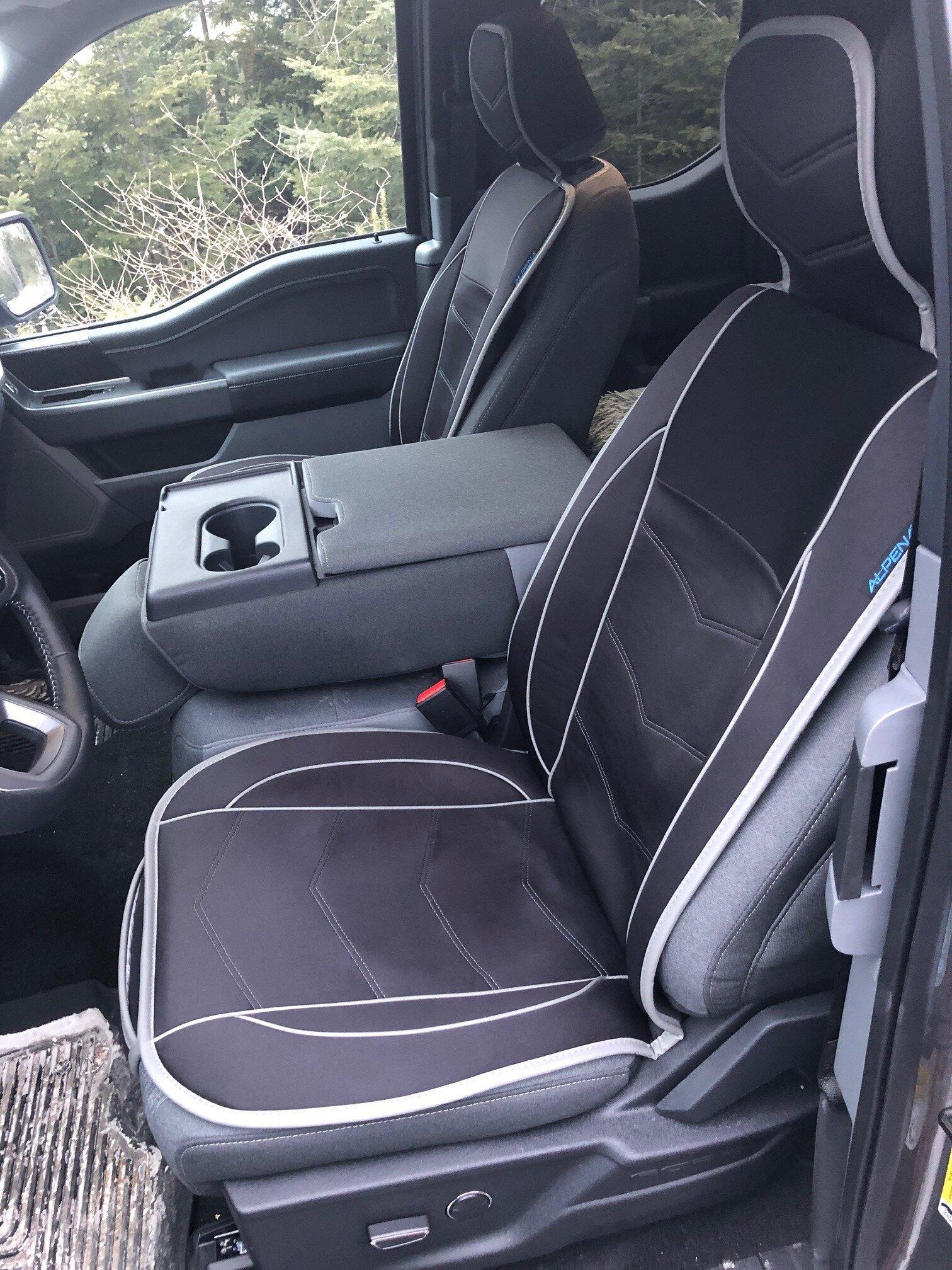 Ford F-150 Lightning Has anyone converted their fold down armrest (40/20/40 front seats) to a flip-up storage bin? 1-