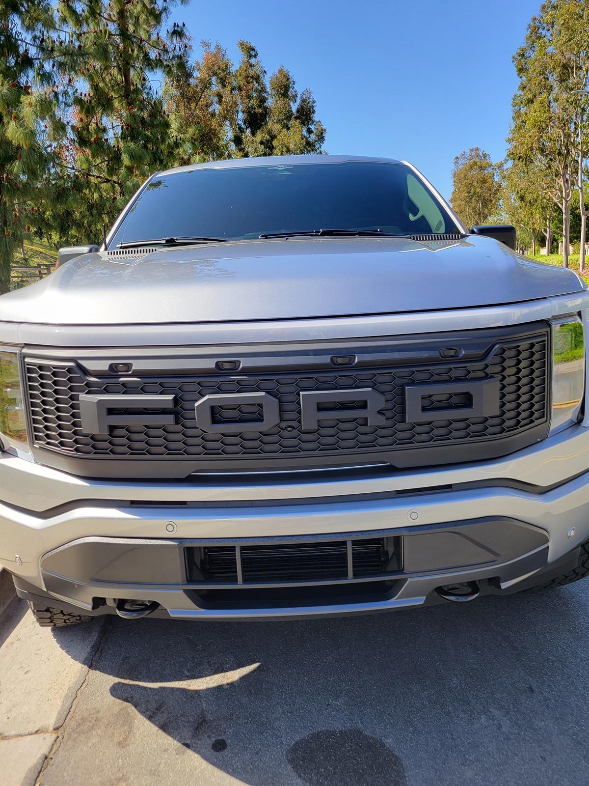 Ford F-150 Lightning ‼️ UPDATE FORD E-RAPTOR grille swap and install tutorial 1000001914