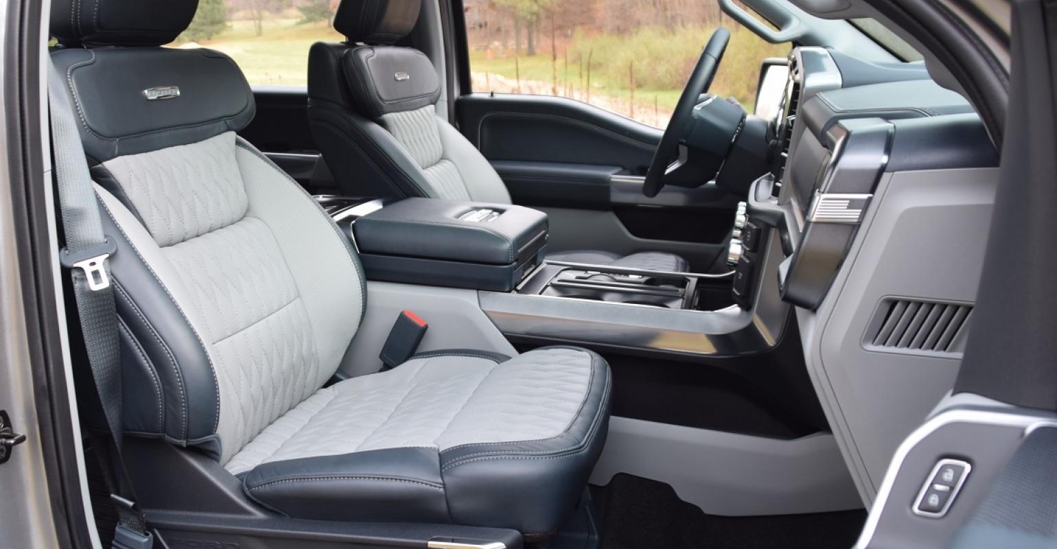 Ford F-150 Lightning Has anyone converted their fold down armrest (40/20/40 front seats) to a flip-up storage bin? 10BI MAIN ART 2021 Ford F-150 front pass seats Limited