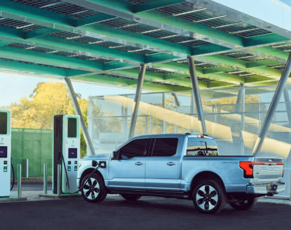 Ford F-150 Lightning Electrify America Unveils New "Oasis" Charging Station and Charger Design. Press Release Features F150L and Pull-Through Charging Spots 1648133705539