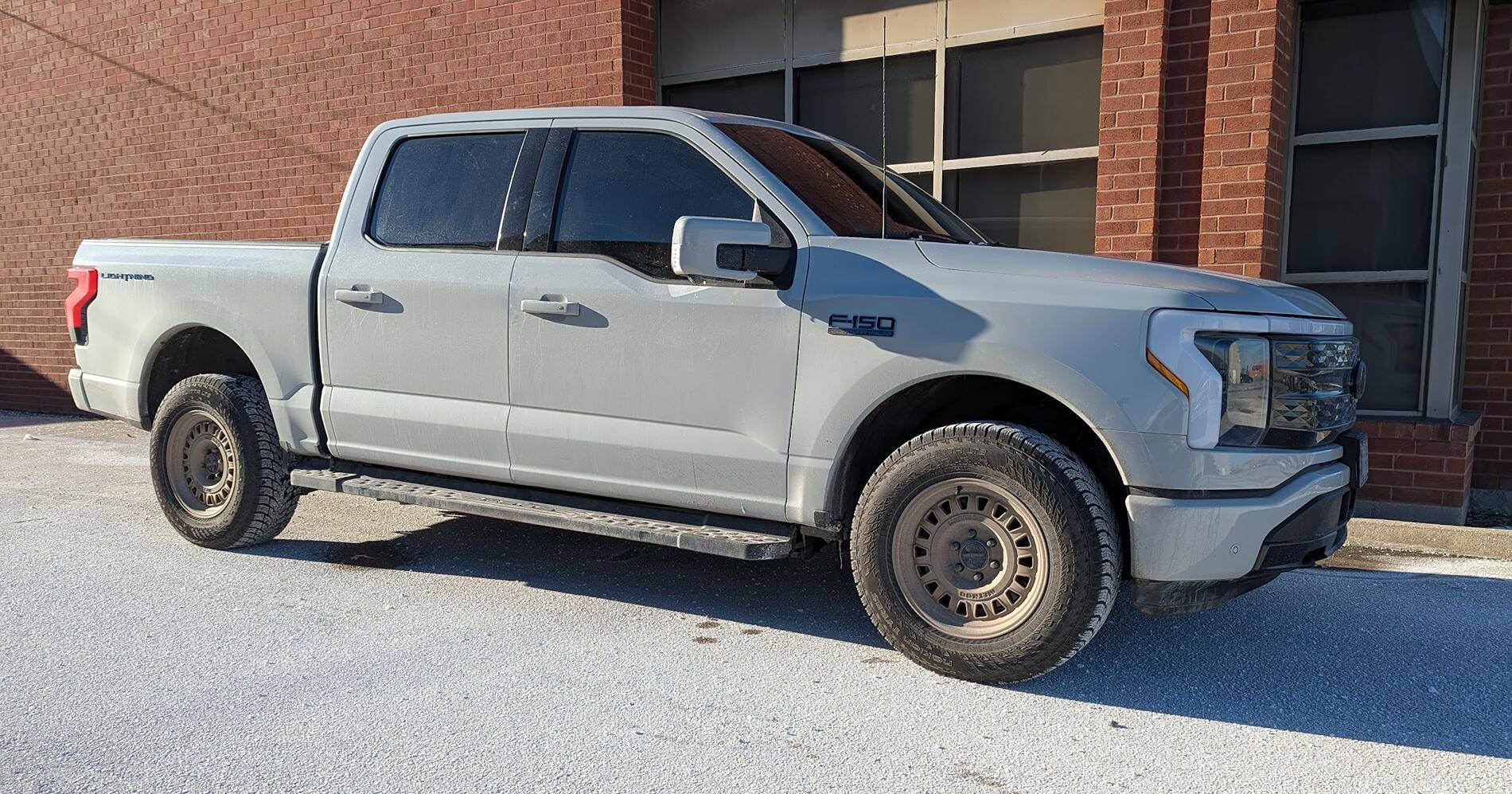 Ford F-150 Lightning 2024 F-150 Lightning XLT on Toyo Open Country A/T 3 tires + electric blue accents 1735502169014-an