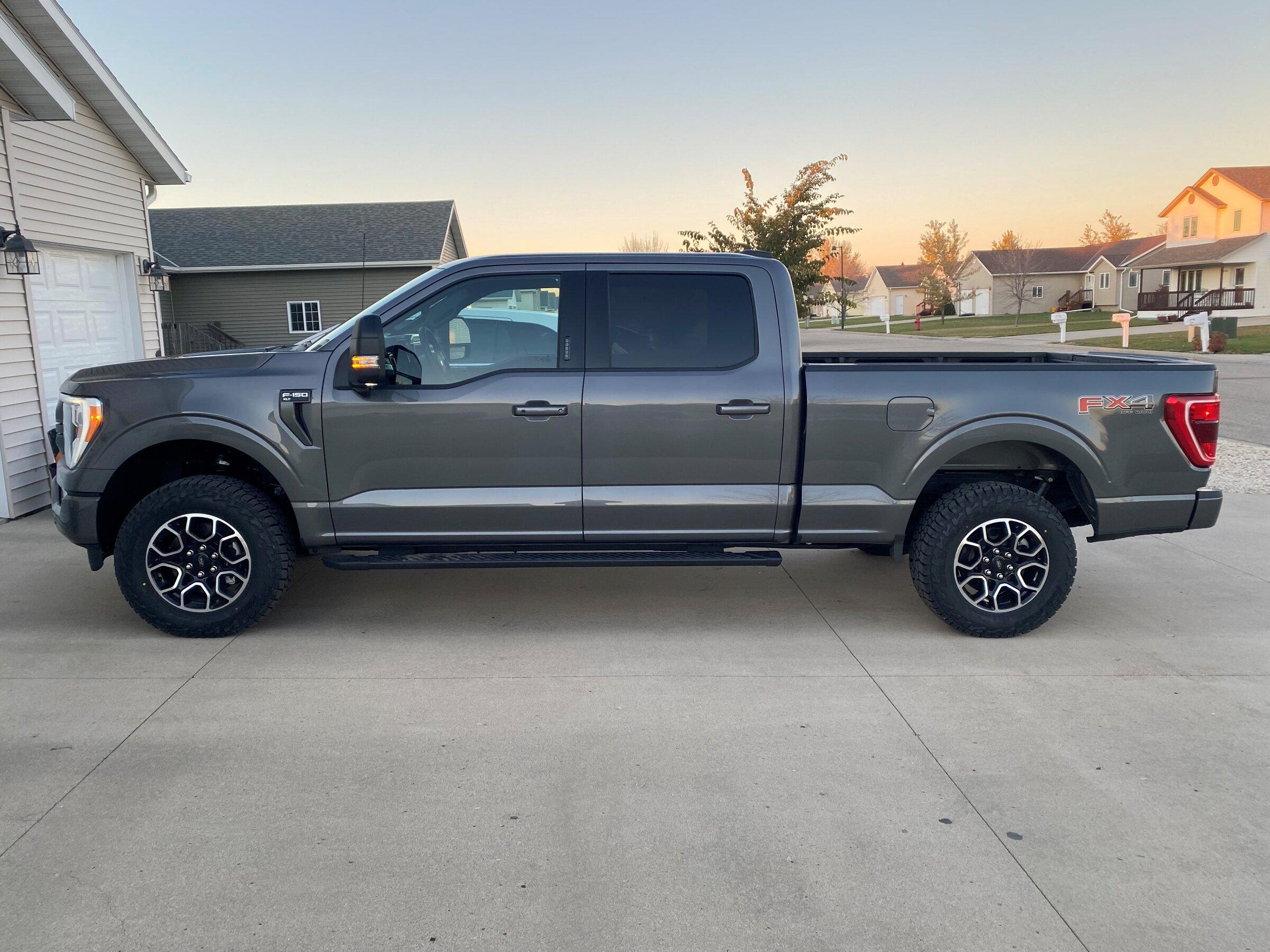 Ford F-150 Lightning Leveled F150 on stock 18”rims and tires 2021 F150