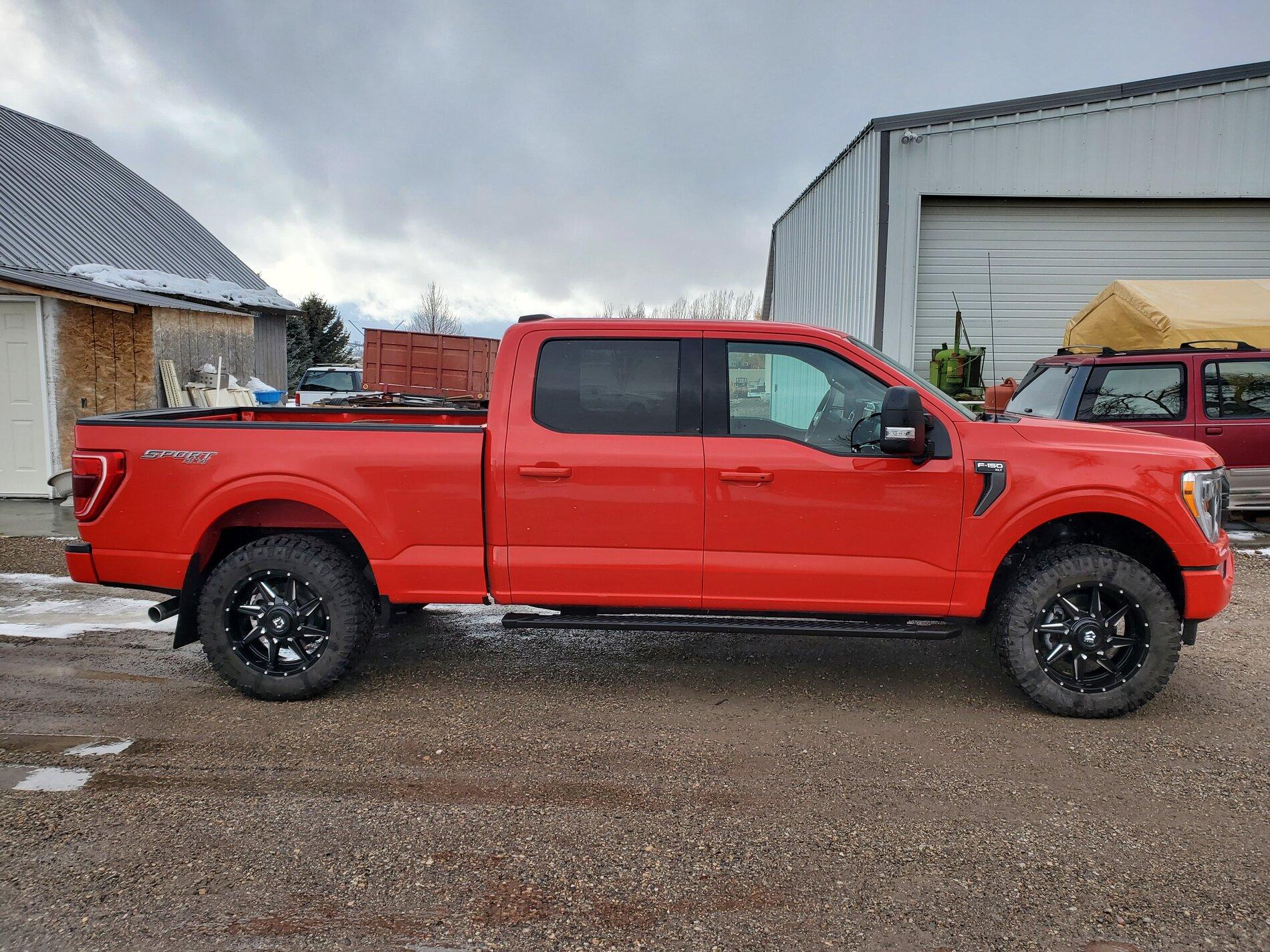 Ford F-150 Lightning 2021 F150 XLT Race Red 305/55/20 tires with 2" leveling kit 20210226_160911