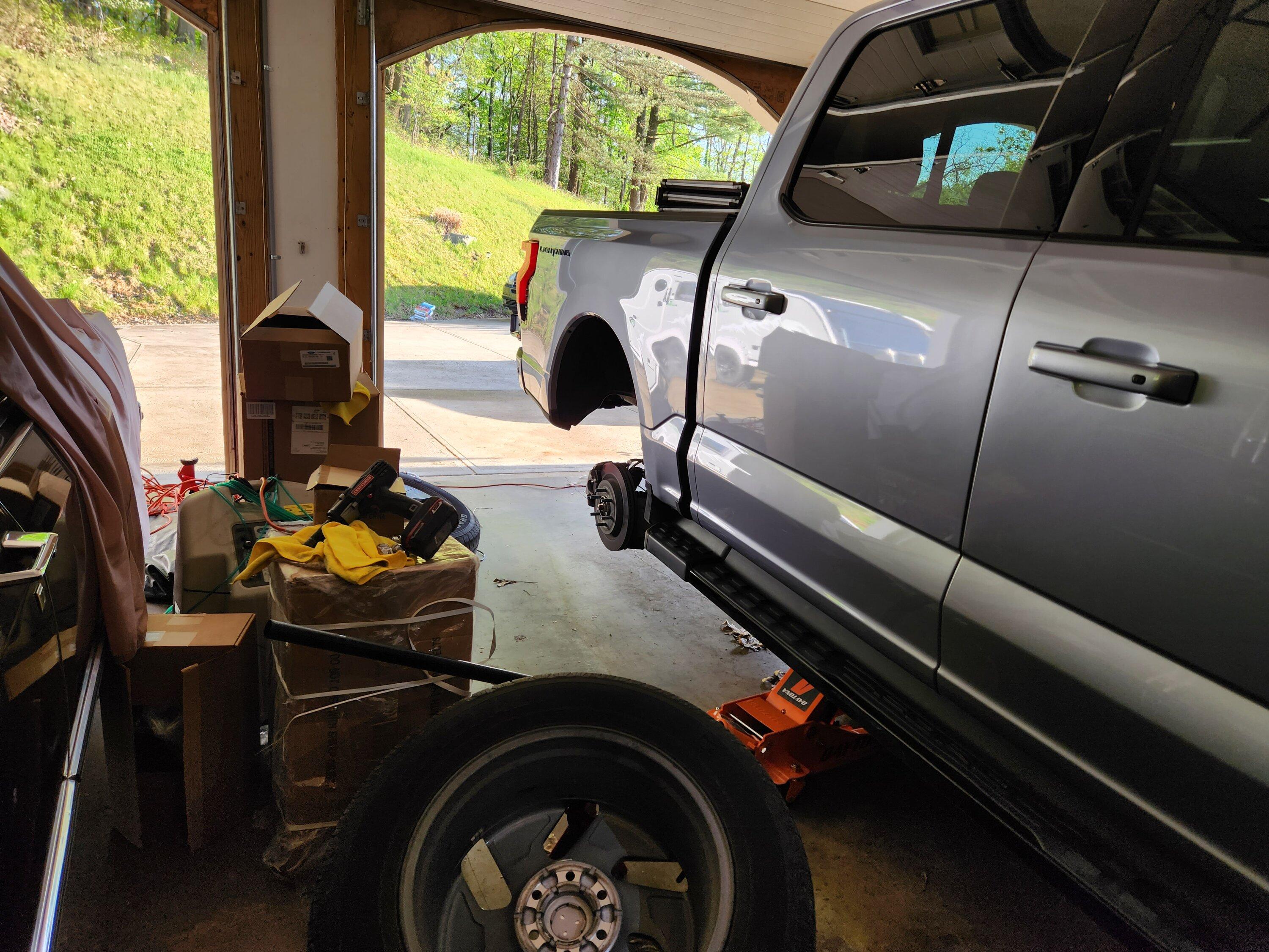 Ford F-150 Lightning How-to DIY: Home Tire Rotation without removing underbody plastic panel shielding 20230513_184508