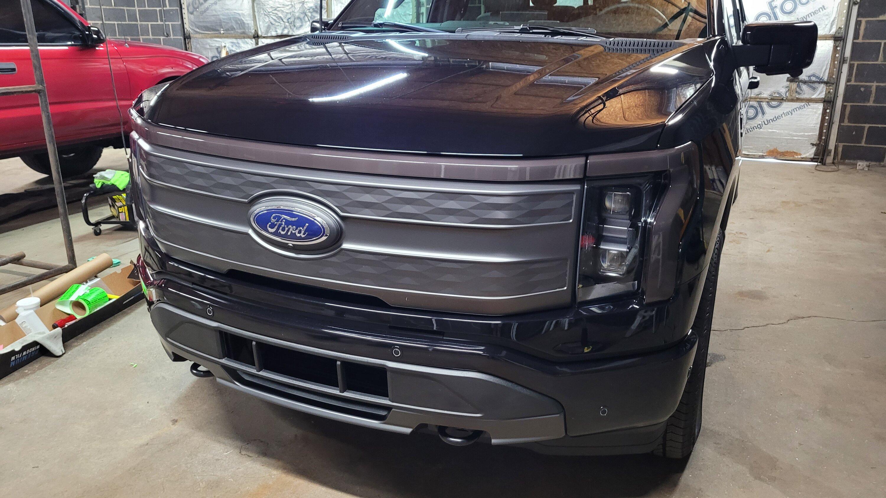 Ford F-150 Lightning Tinted front light bar on F150 Lightning using special tint made for lights 20230810_161300