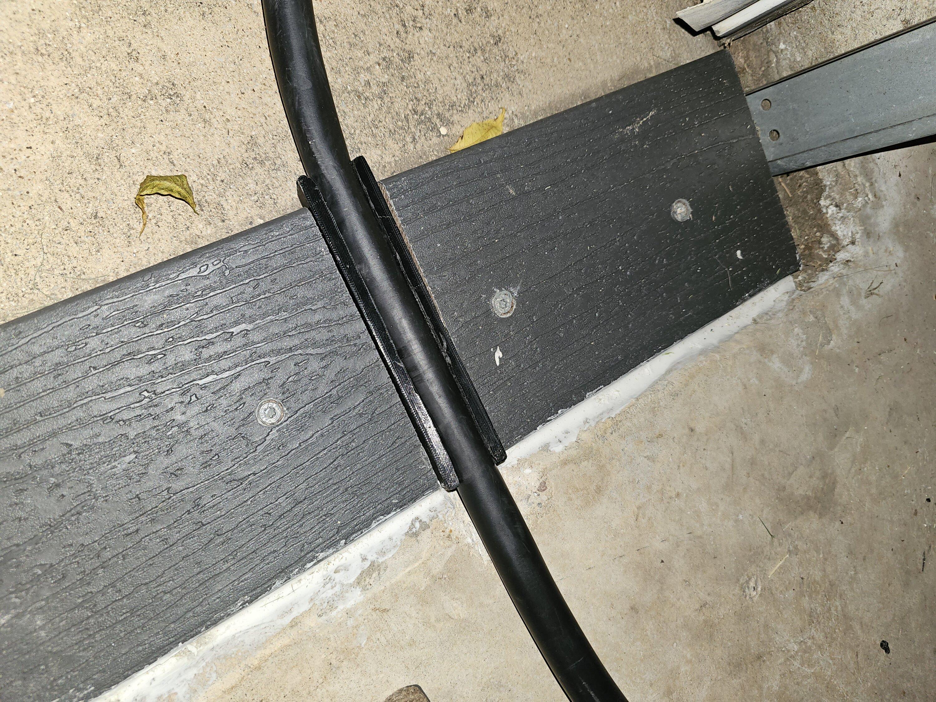 Ford F-150 Lightning Charging under the garage door, what do you use to protect the cable 20231003_051358