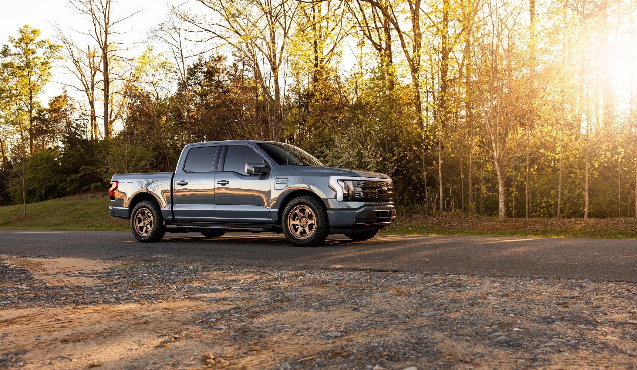 Ford F-150 Lightning Beauty shots of my Lightning. New, fully forged Trex T-200 bronze wheels, ICON stage IV lowering kit, gloss black vinyl wrapped grill, other goodies. 20240406-9j0a4986-edit