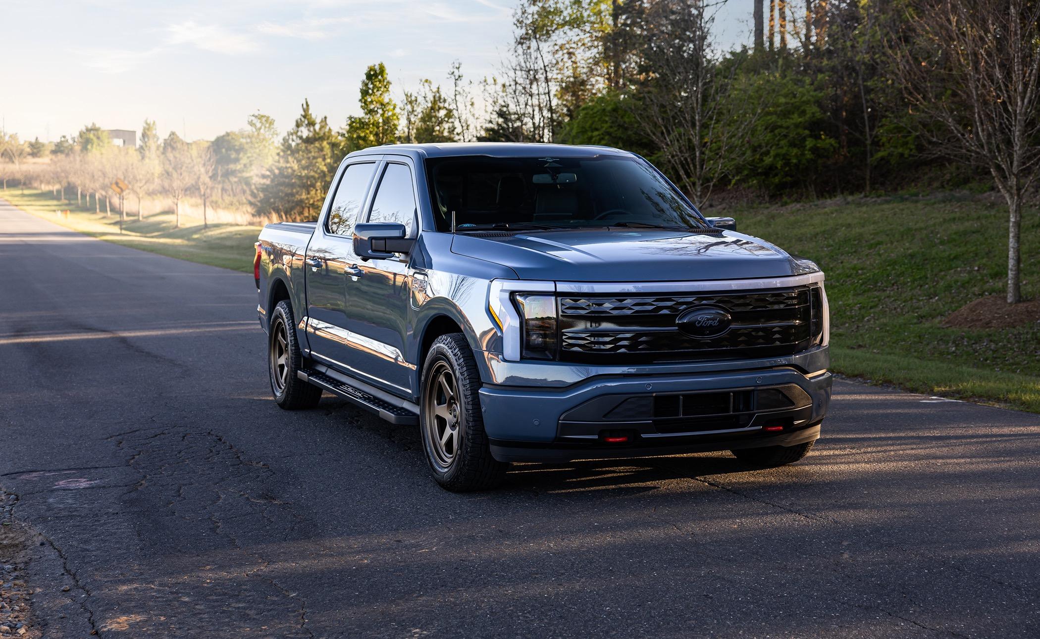 Ford F-150 Lightning Beauty shots of my Lightning. New, fully forged Trex T-200 bronze wheels, ICON stage IV lowering kit, gloss black vinyl wrapped grill, other goodies. 20240406-9j0a4994-edit