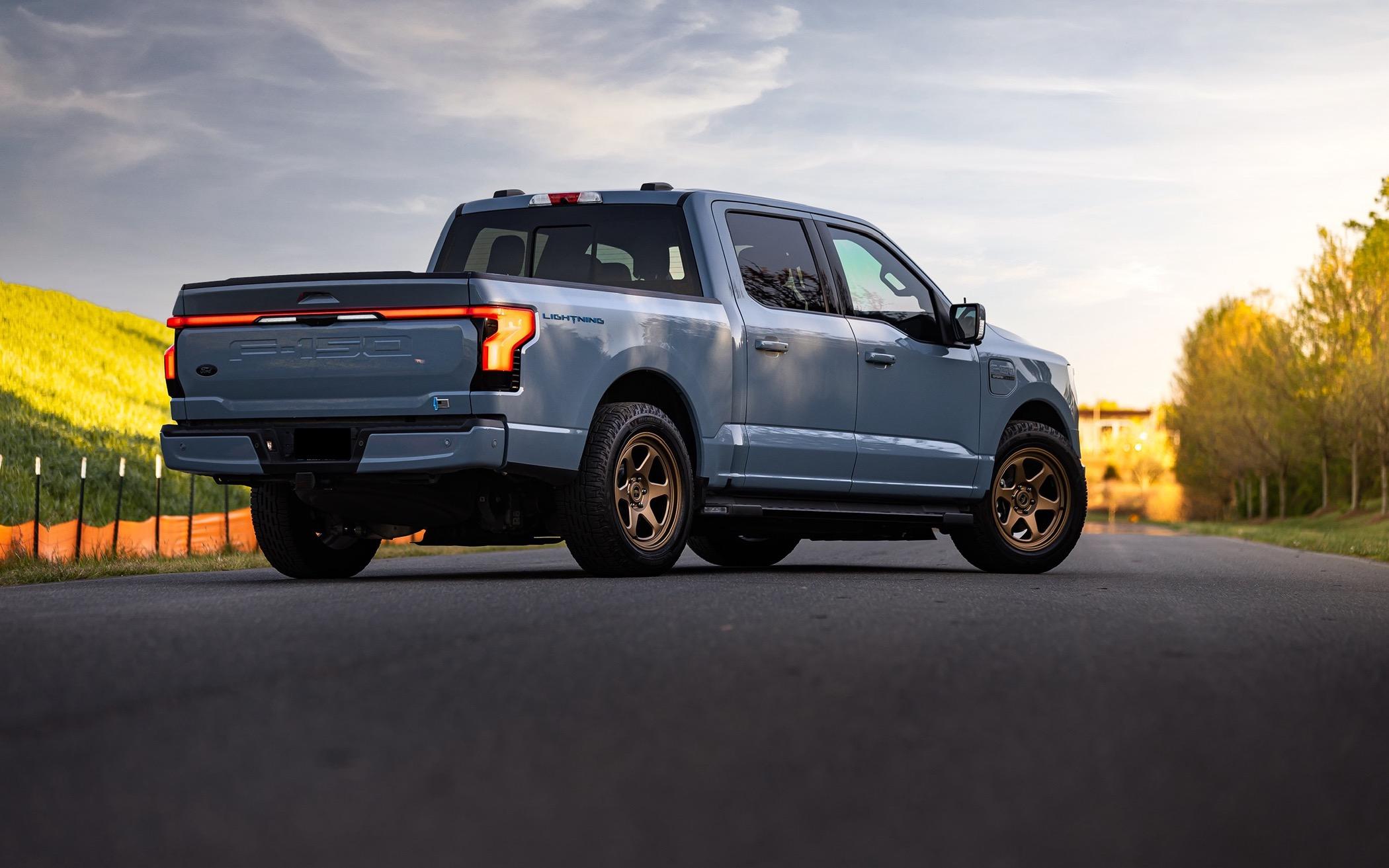 Ford F-150 Lightning Beauty shots of my Lightning. New, fully forged Trex T-200 bronze wheels, ICON stage IV lowering kit, gloss black vinyl wrapped grill, other goodies. 20240406-9j0a5178-edit