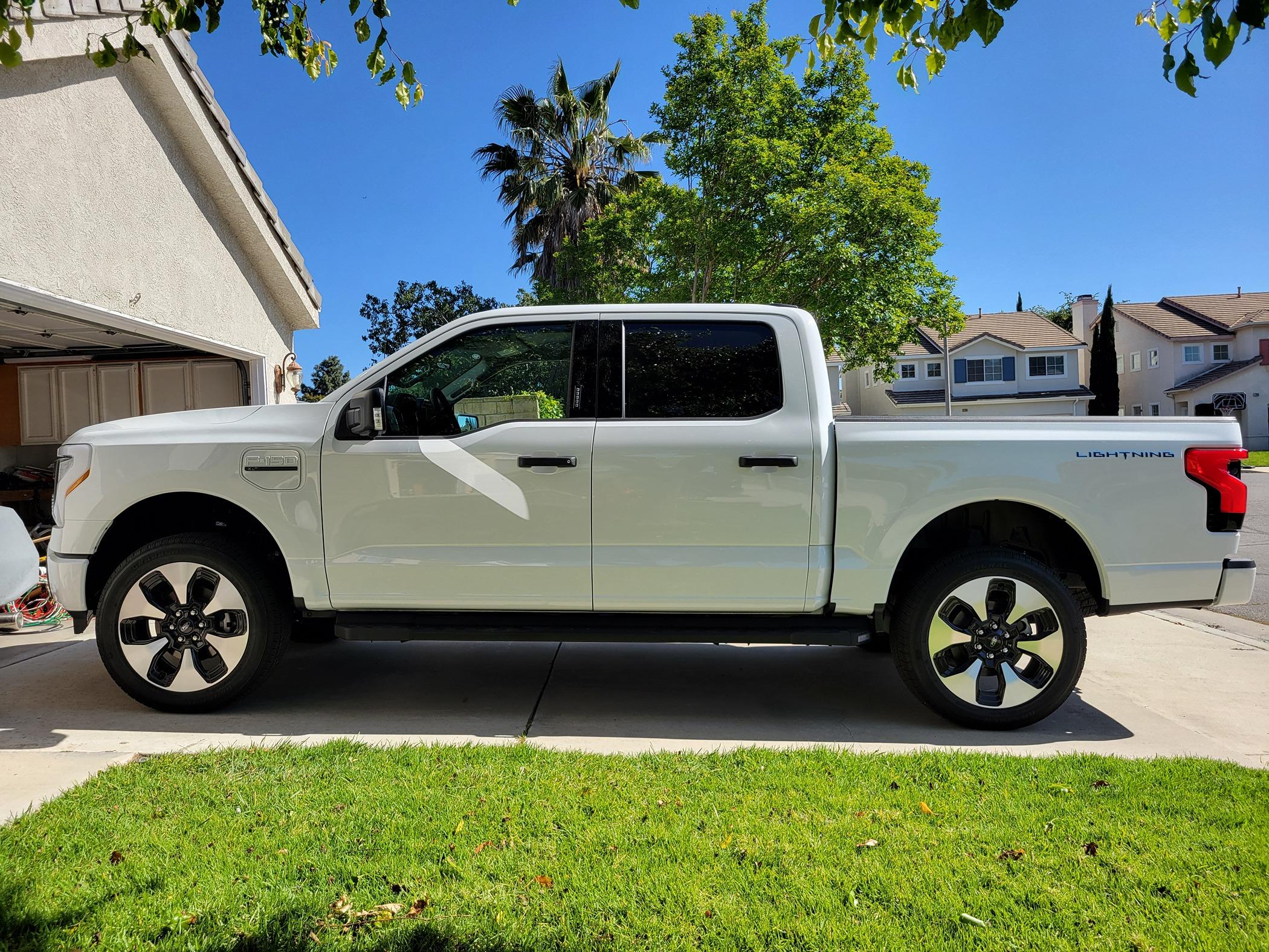 Ford F-150 Lightning My '23 F150L XLT with Rough Country Leveling Kit on factory 22" wheels. 20240428_160456