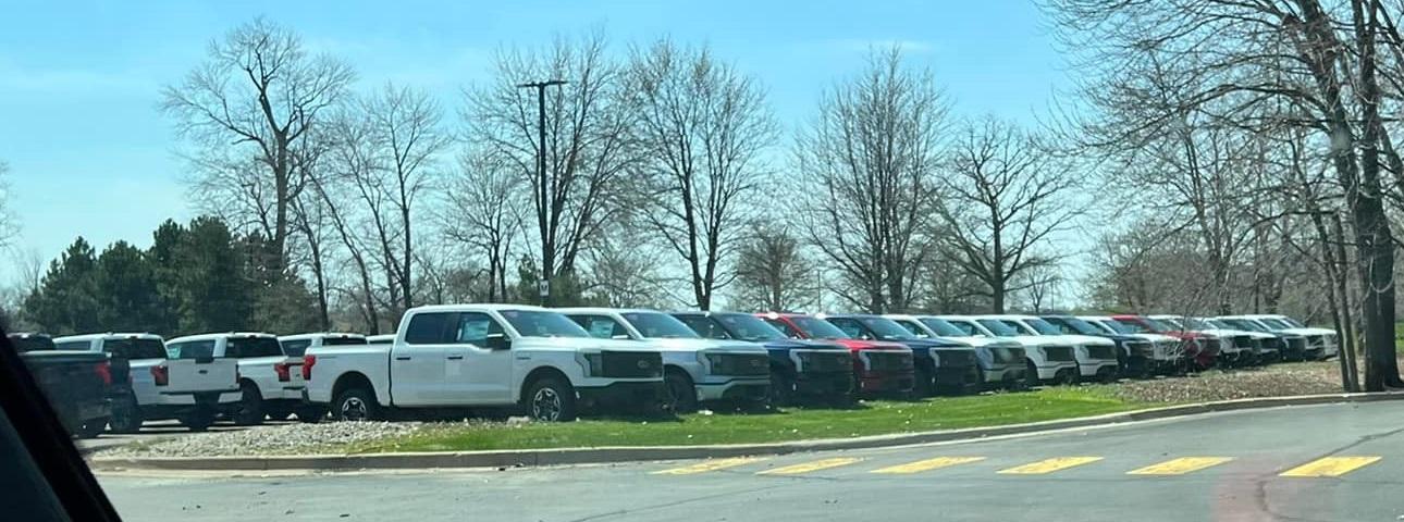 Ford F-150 Lightning Production Lightnings parked outside Dearborn 278709854_1771578953233392_1585246495739761462_nSM