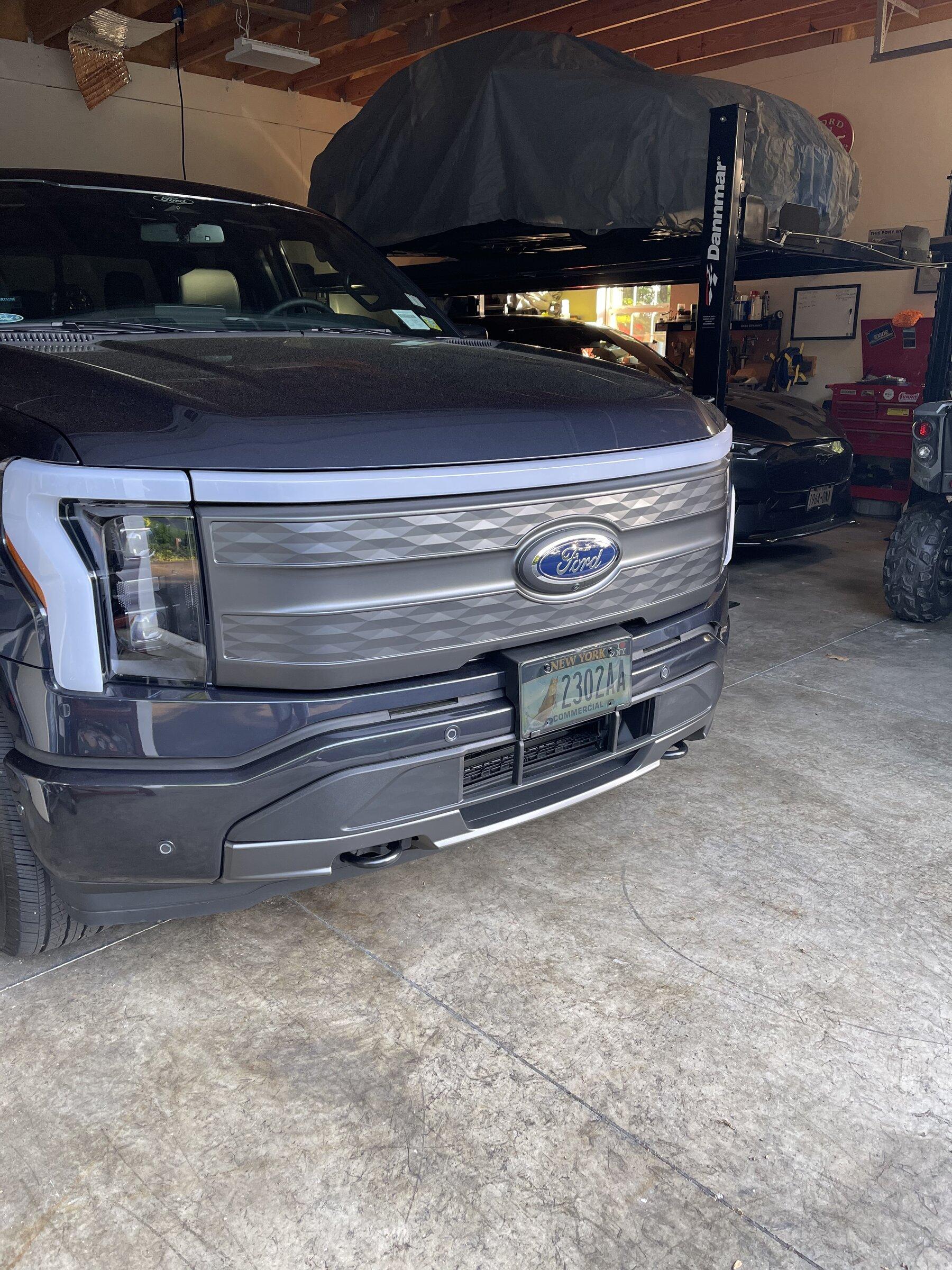 Ford F-150 Lightning Front license plate blocking active shutters ? Anyone concerned in states that require front plates? Holes in bumper OK? 398AE4FD-9E0F-4F04-B233-90AA55C1CC2F