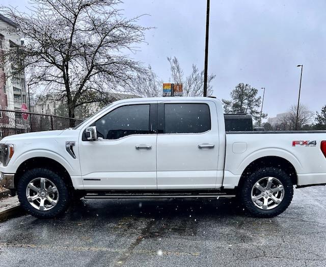 Ford F-150 Lightning Anyone installed the new Readylift 2" level kit specifically for 2021 F-150? 9304581A-86B9-4F2E-A757-ECBCABE926D9