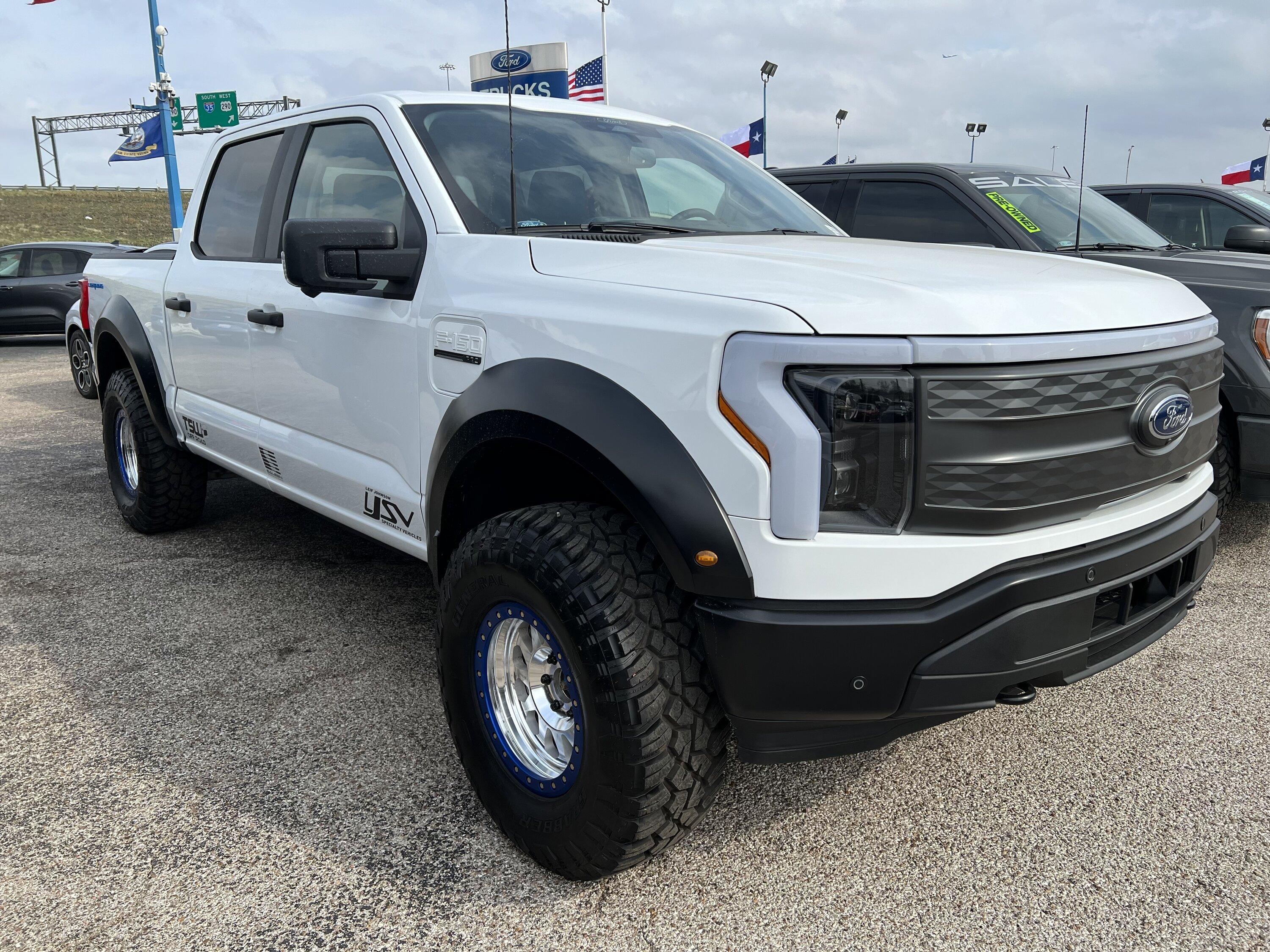 Ford F-150 Lightning Lightning Pro upgraded with Raptor suspension and full light bar -- drove it 9D6CD81D-4CEC-4B5C-BDFE-CD67269B80FD