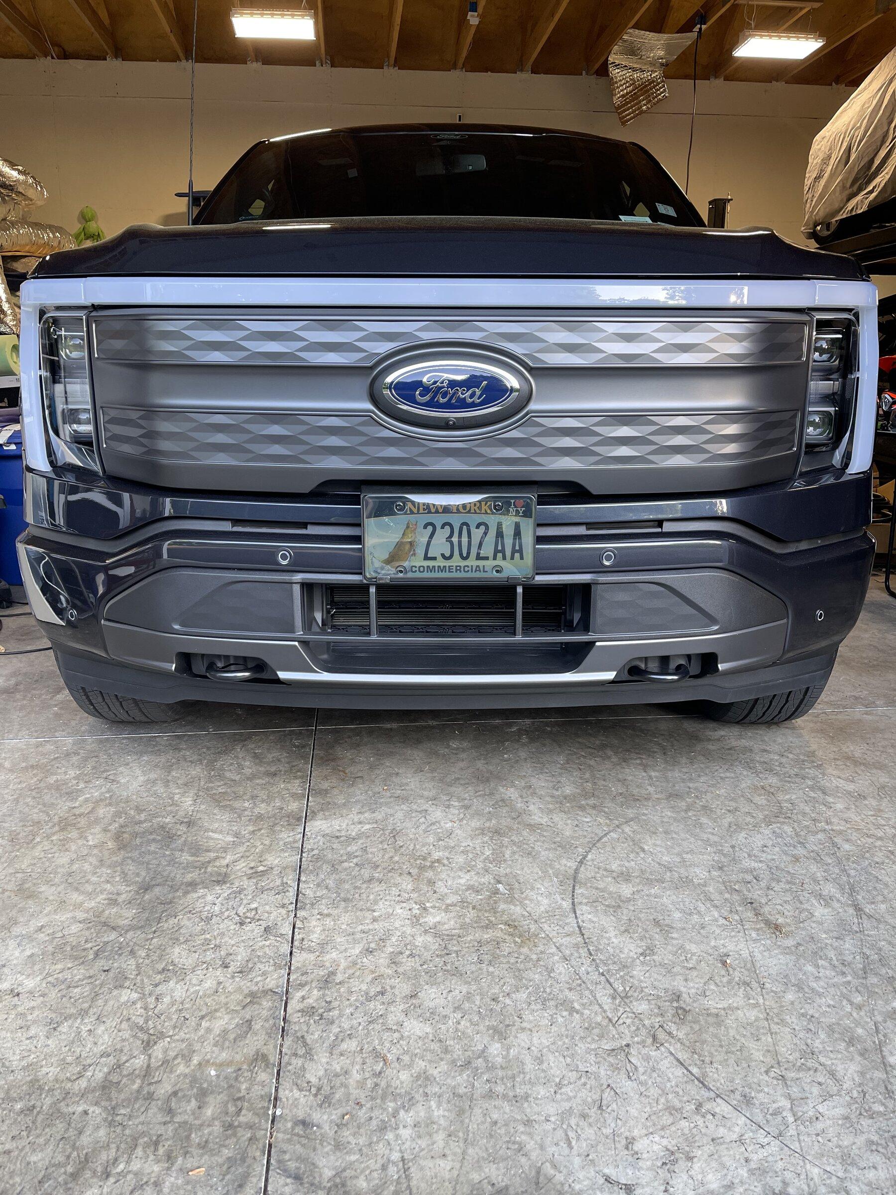 Ford F-150 Lightning Front license plate blocking active shutters ? Anyone concerned in states that require front plates? Holes in bumper OK? A425F657-CA67-4292-856C-A35C0C075ADC