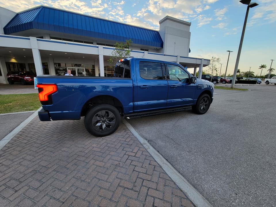 Ford F-150 Lightning [Correction] Atlas Blue F-150 Lightning preproduction at dealer Antimatter Blue Metallic Mannequin demo F-150 Lightning now arriving at dealers 1