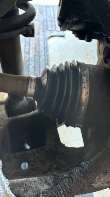 Ford F-150 Lightning Replaced:  Rear Driver DRIVE AXLE...  under warranty @ 49,000 miles caking on rear drive axle area