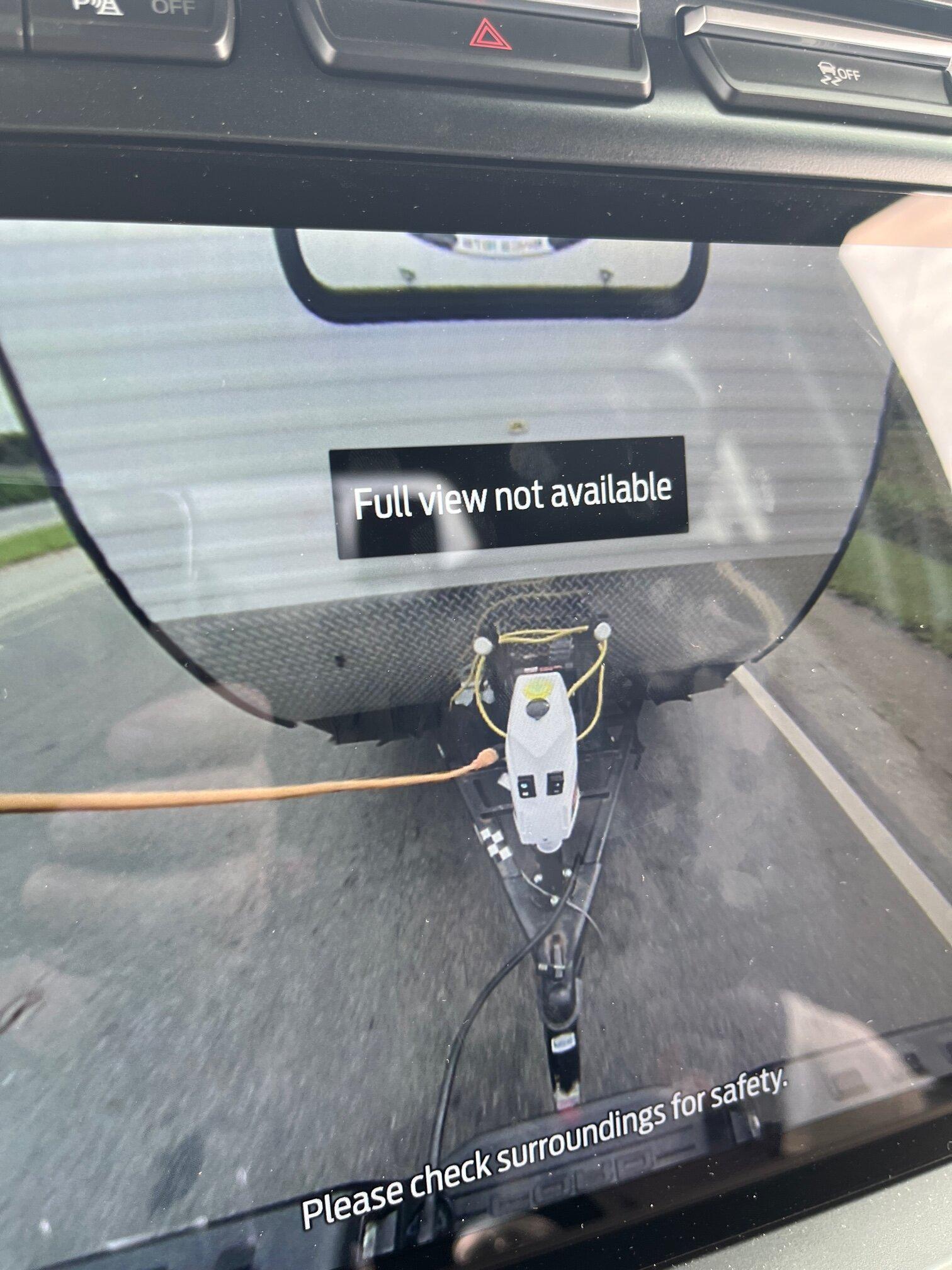 Ford F-150 Lightning 250 mile trip report: Lightning PRO - TOWING 3,000lb Powered Camper... CAMPER rear view monitor.JPG