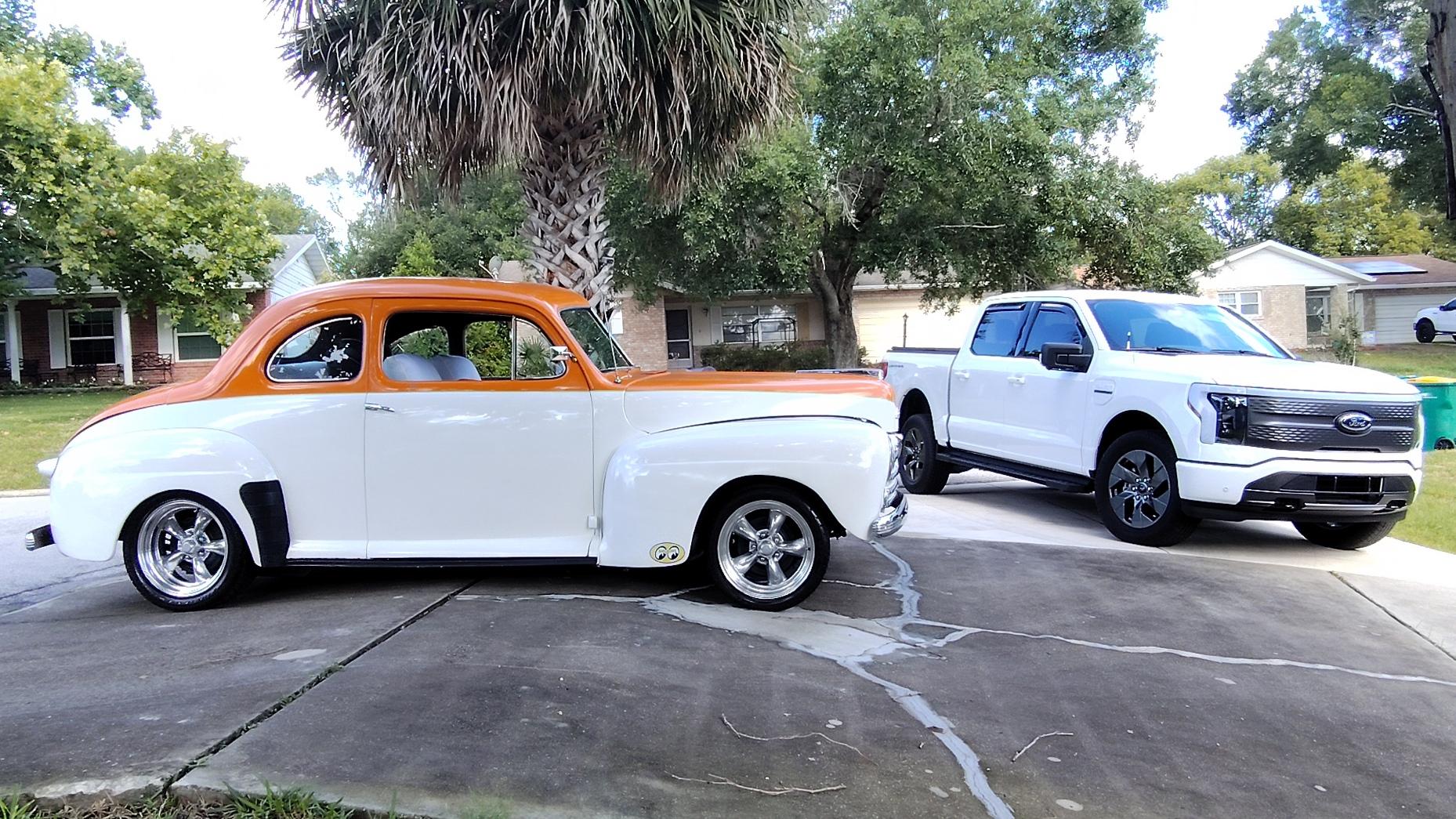 Ford F-150 Lightning Ford's Future and Past in One Pic couple fords