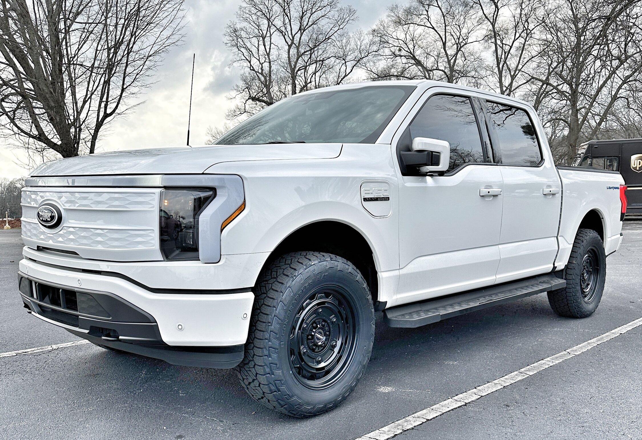 Ford F-150 Lightning Just a little bigger: 2" Readylift Lift Kit, 20" Brink Barracks wheels, Nitto Recon Grappler tires, white grille (Star White Lightning) E3C8AD84-8329-4148-9695-02D19EBCC37D