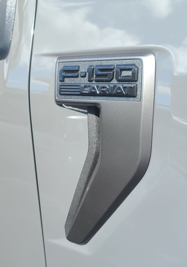 Ford F-150 Lightning Thinking about removing the Powerboost emblems F-150 Emblem.JPG