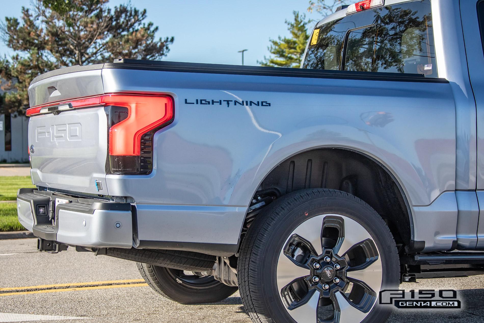 Ford F-150 Lightning F-150 Lightning Platinum (Iconic Silver) & Lariat (Rapid Red) Spotted On Public Roads Iced Blue Silver 2022 F150 Lightning Platinum EV Truck Spotted 10