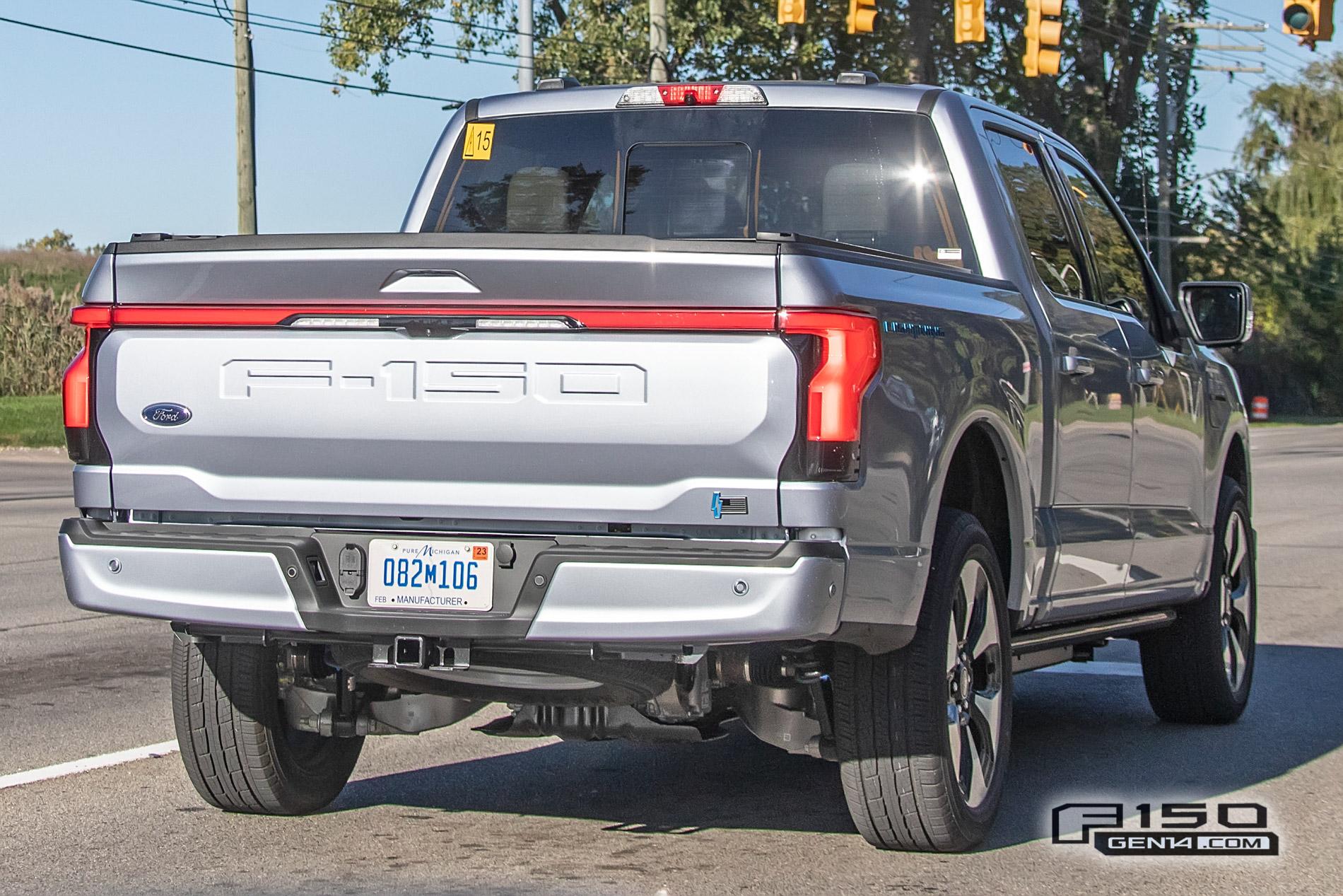 Ford F-150 Lightning F-150 Lightning Platinum (Iconic Silver) & Lariat (Rapid Red) Spotted On Public Roads Iced Blue Silver 2022 F150 Lightning Platinum EV Truck Spotted 12