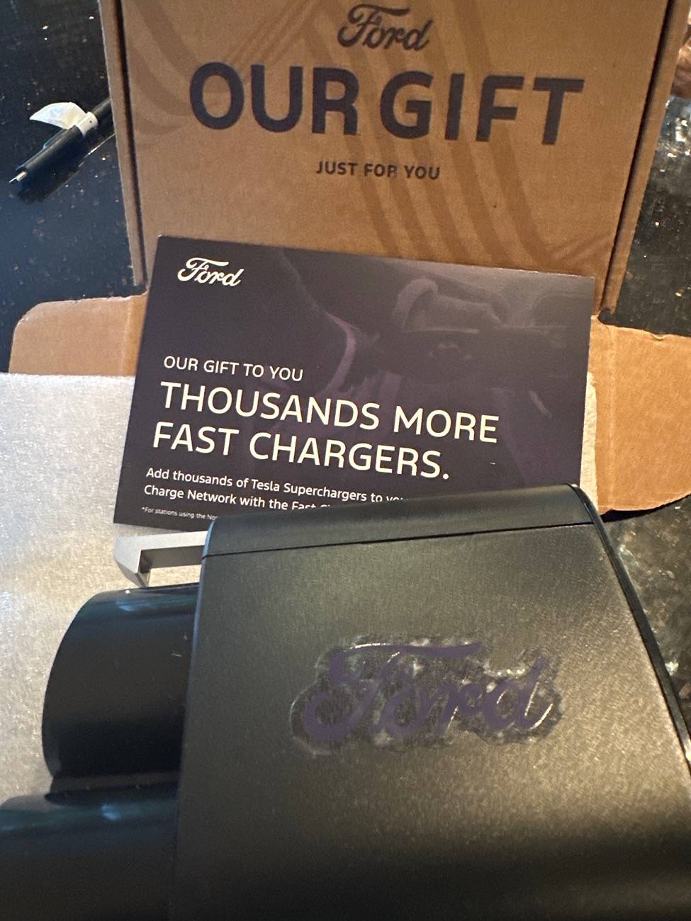 Ford F-150 Lightning Ford Resumes Shipping Fast Charging Adapters image