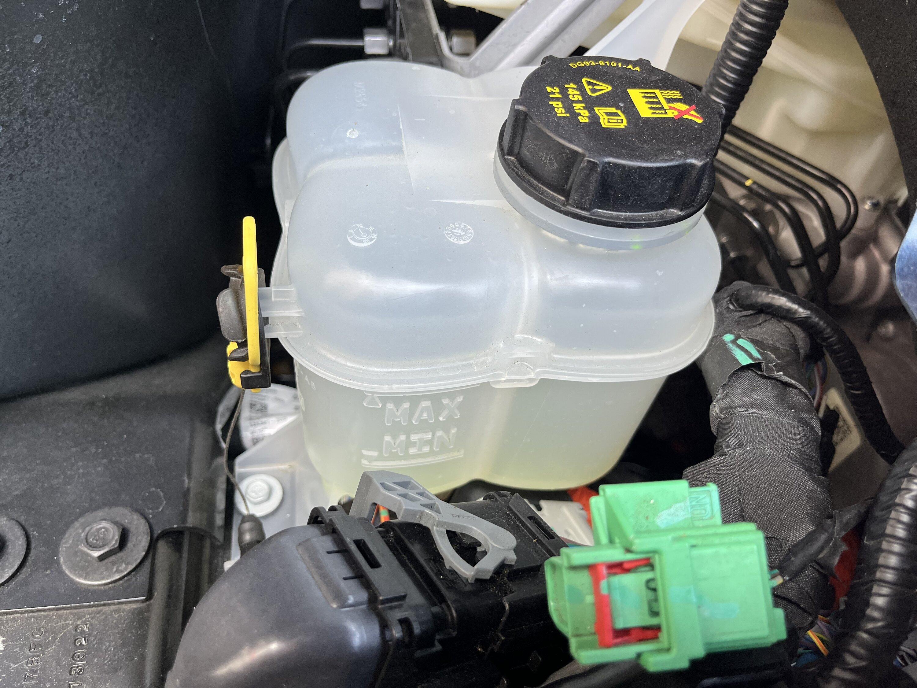 Ford F-150 Lightning Motor Overheated and Disabled -  [cracked coolant line] IMG_0781