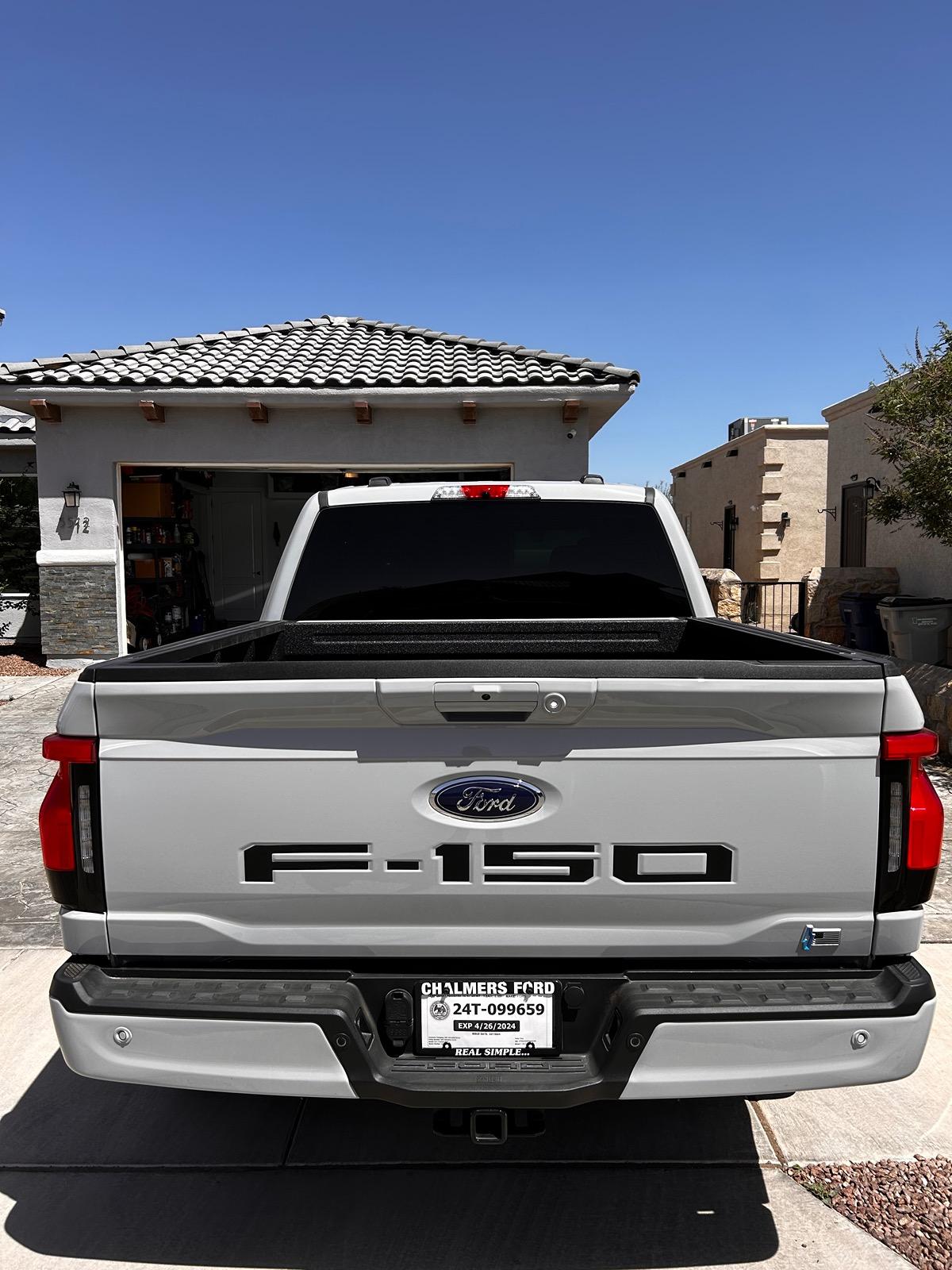 Ford F-150 Lightning Tailgate and charge port lettering IMG_1940