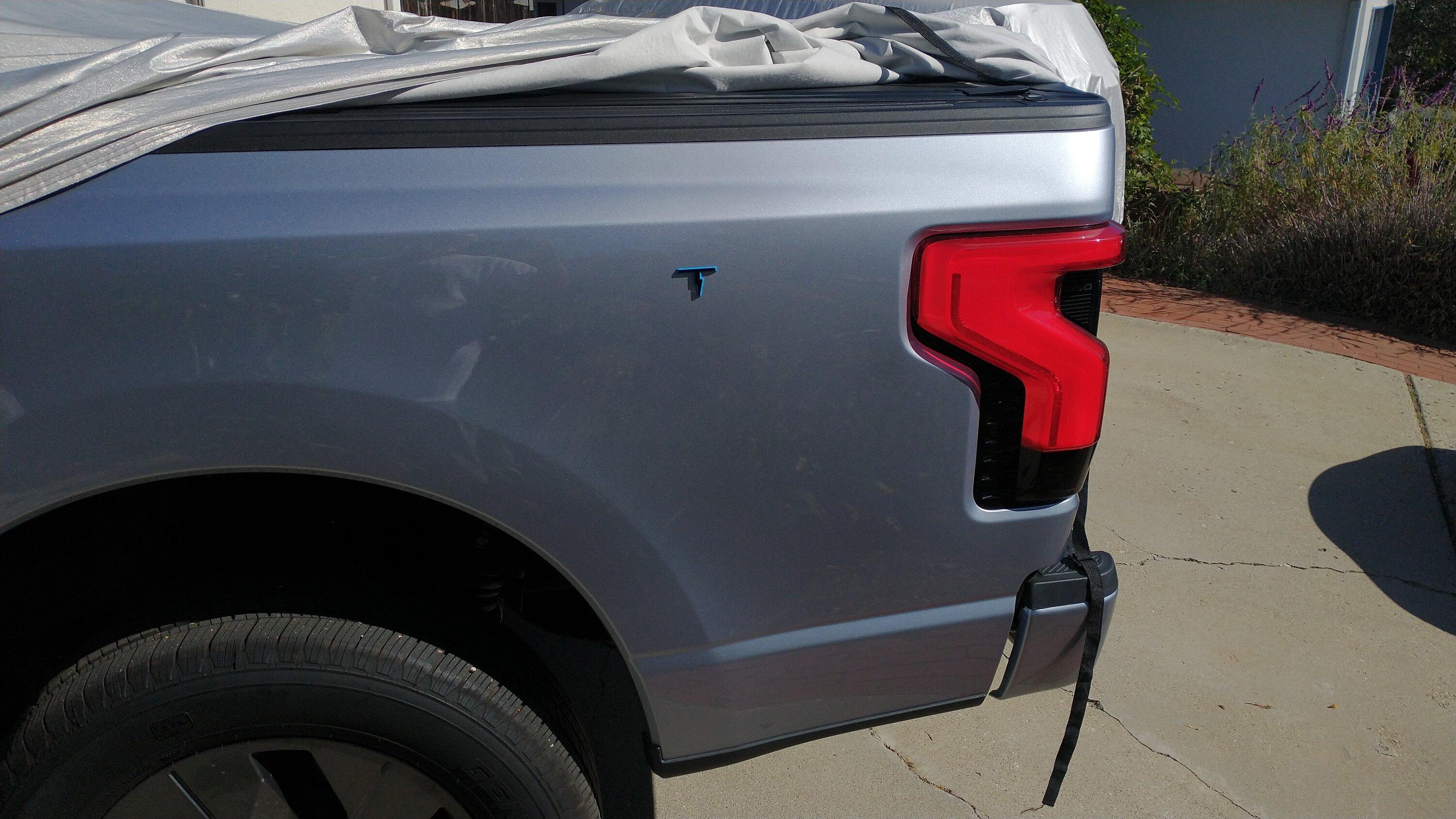 Ford F-150 Lightning White Lightning Decal IMG_20231103_122209617_BURST000_COVER Lightning pickup bed letters removed except for the T