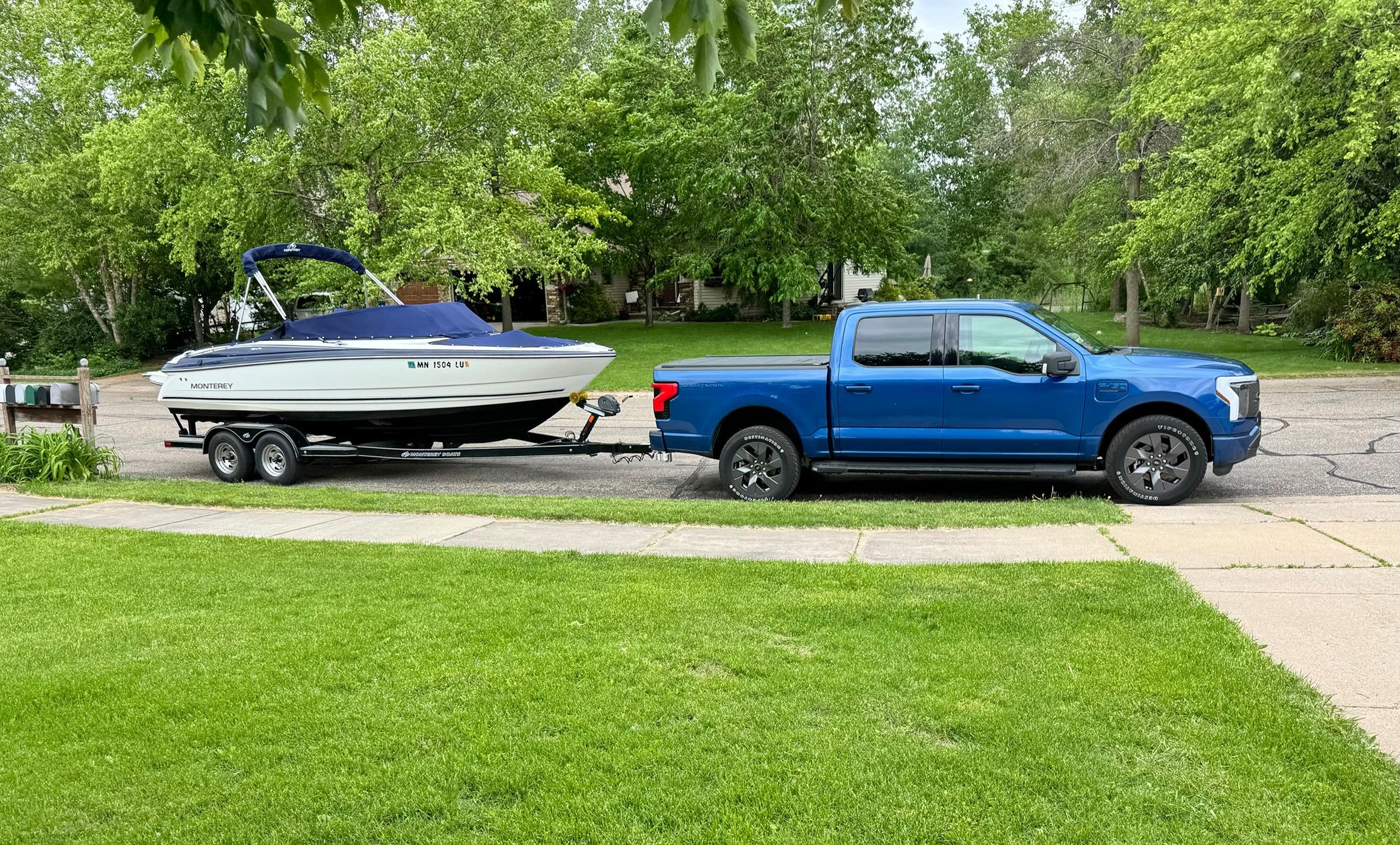 Ford F-150 Lightning Towing a 5,500 lbs boat without Max Tow... it's been great! IMG_2034