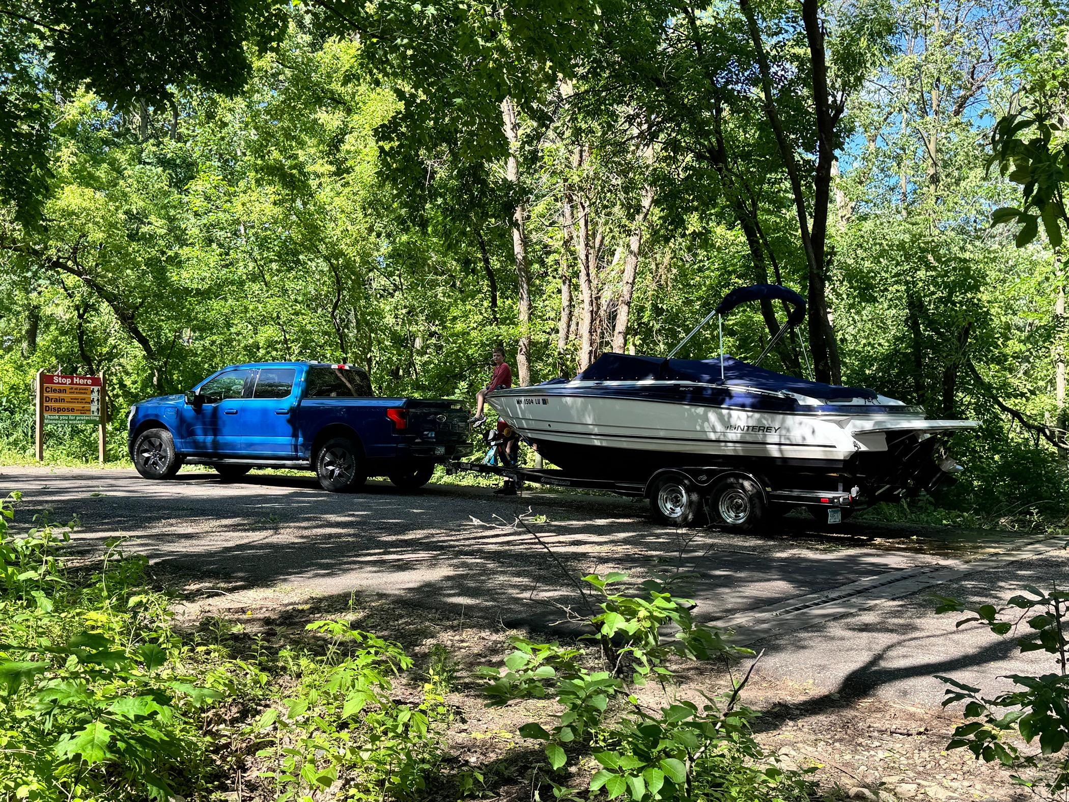 Ford F-150 Lightning Towing a 5,500 lbs boat without Max Tow... it's been great! IMG_2067