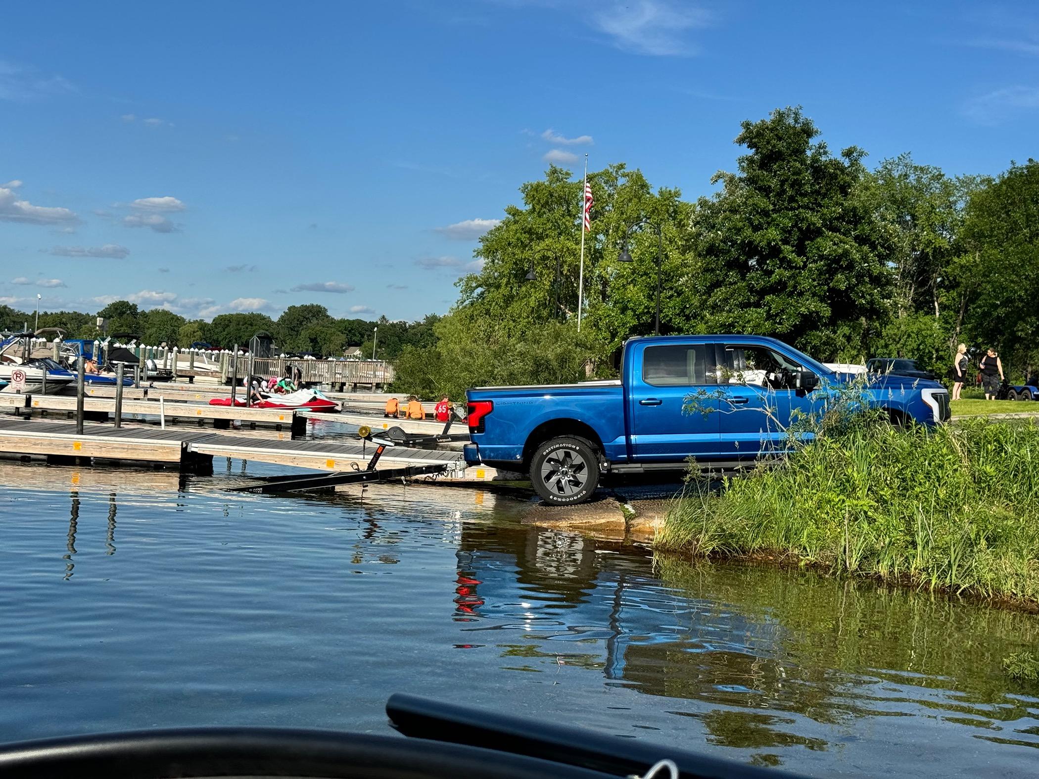 Ford F-150 Lightning Towing a 5,500 lbs boat without Max Tow... it's been great! IMG_2284