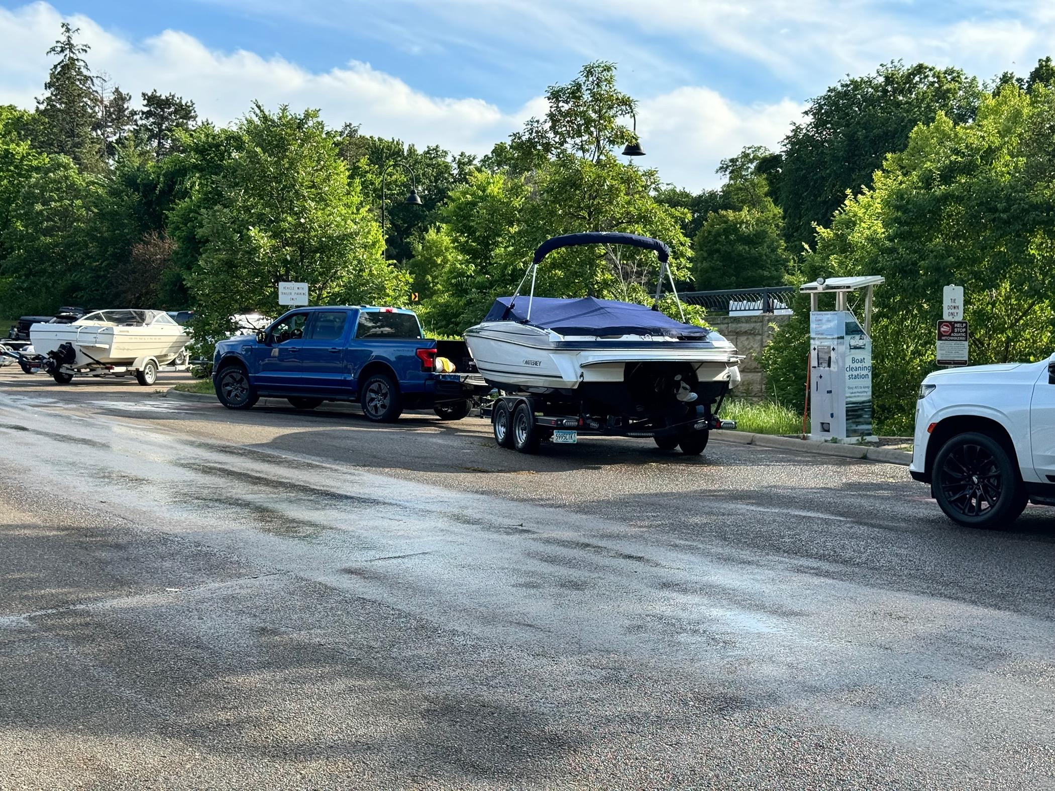 Ford F-150 Lightning Towing a 5,500 lbs boat without Max Tow... it's been great! IMG_2285