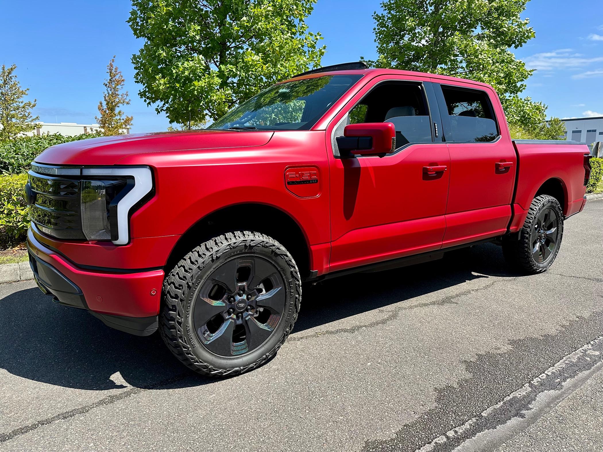 Ford F-150 Lightning My '23 F150L XLT with Rough Country Leveling Kit on factory 22" wheels. IMG_3185