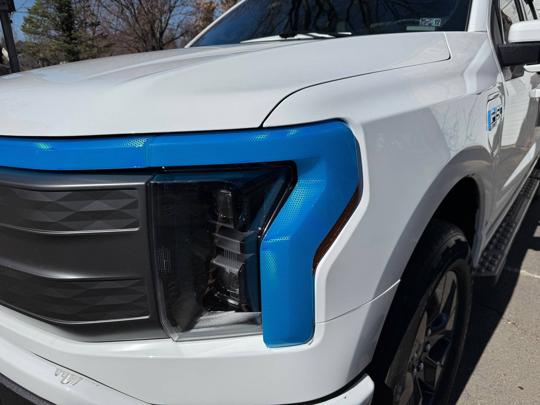 Ford F-150 Lightning Blue tint on clear plastics IMG_3700