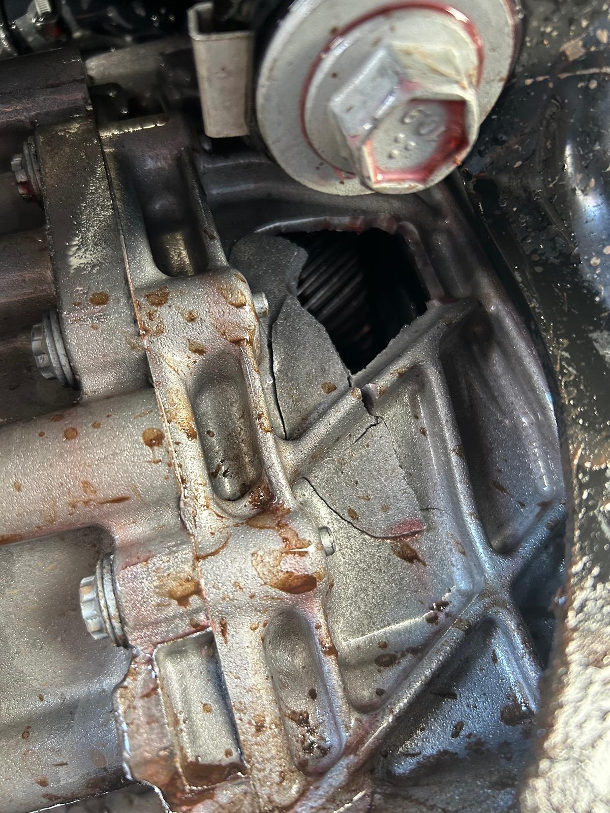 Ford F-150 Lightning Rear motor rattling with red fluid leaking IMG_3810