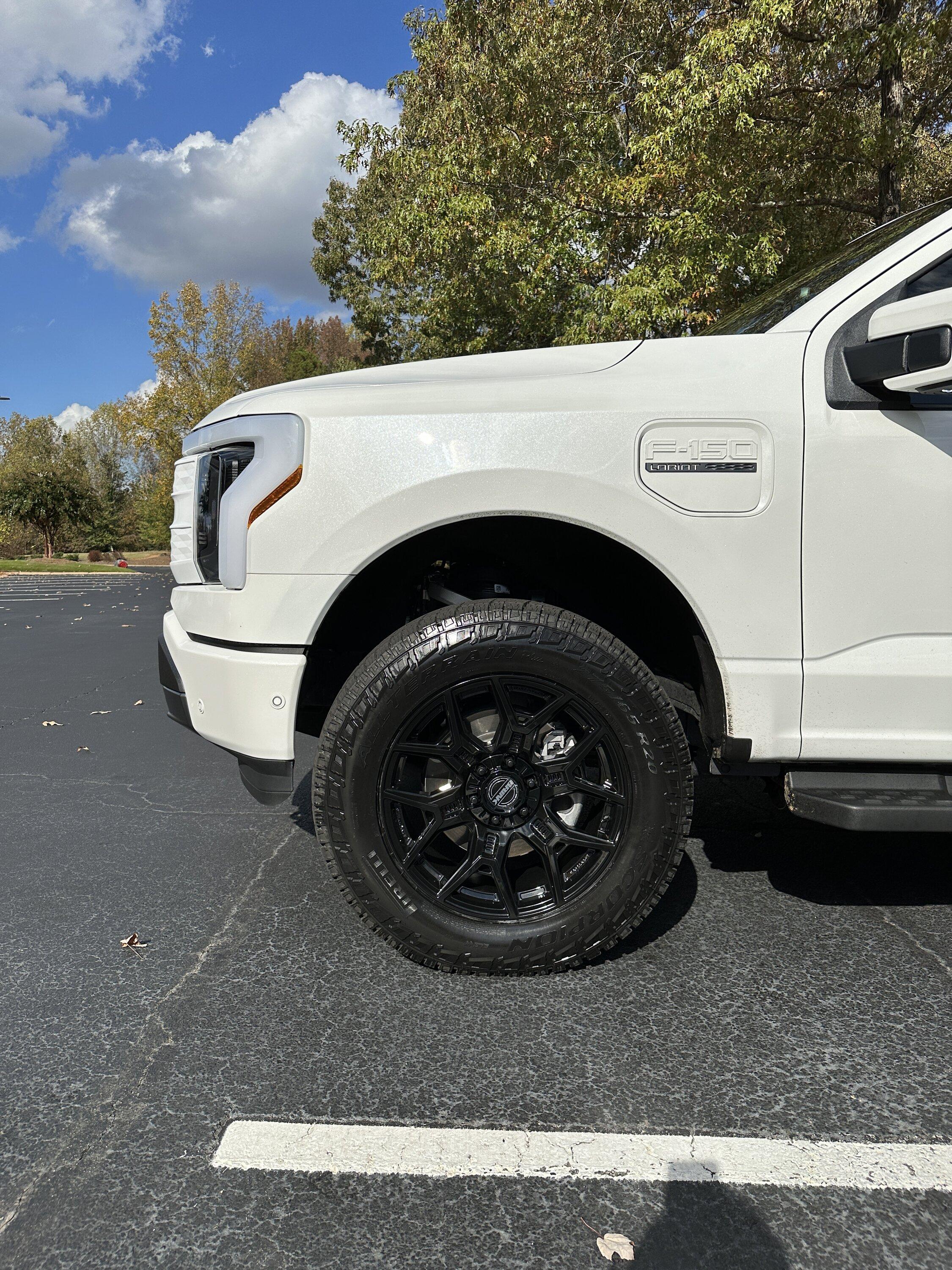 Ford F-150 Lightning Just a little bigger: 2" Readylift Lift Kit, 20" Brink Barracks wheels, Nitto Recon Grappler tires, white grille (Star White Lightning) IMG_4040