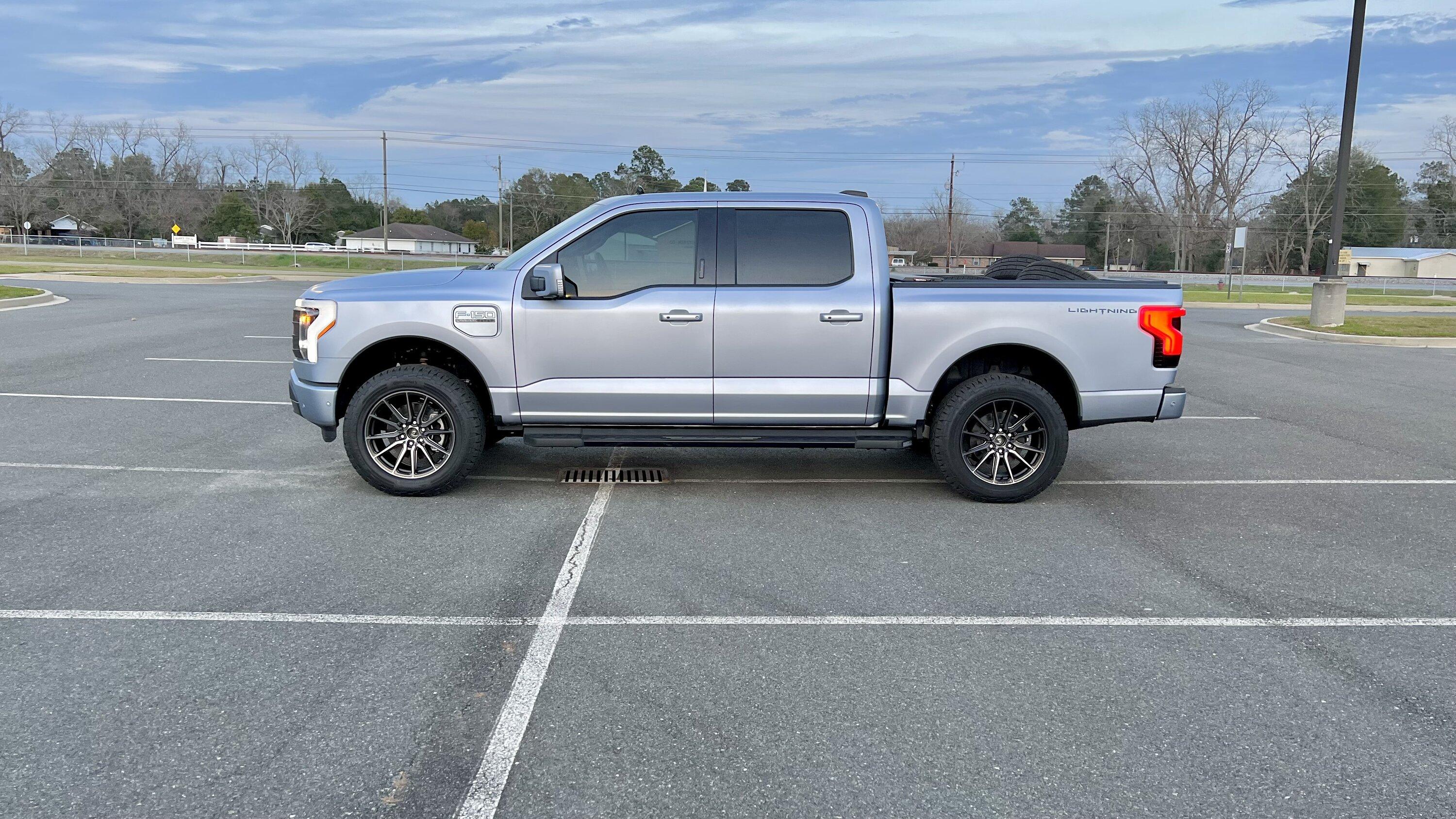 Ford F-150 Lightning Iced Blue Silver Lightning Build. Mods: PPF matte finish, Line-X, gloss black painted grille, black wrapped roof, wheels IMG_4123