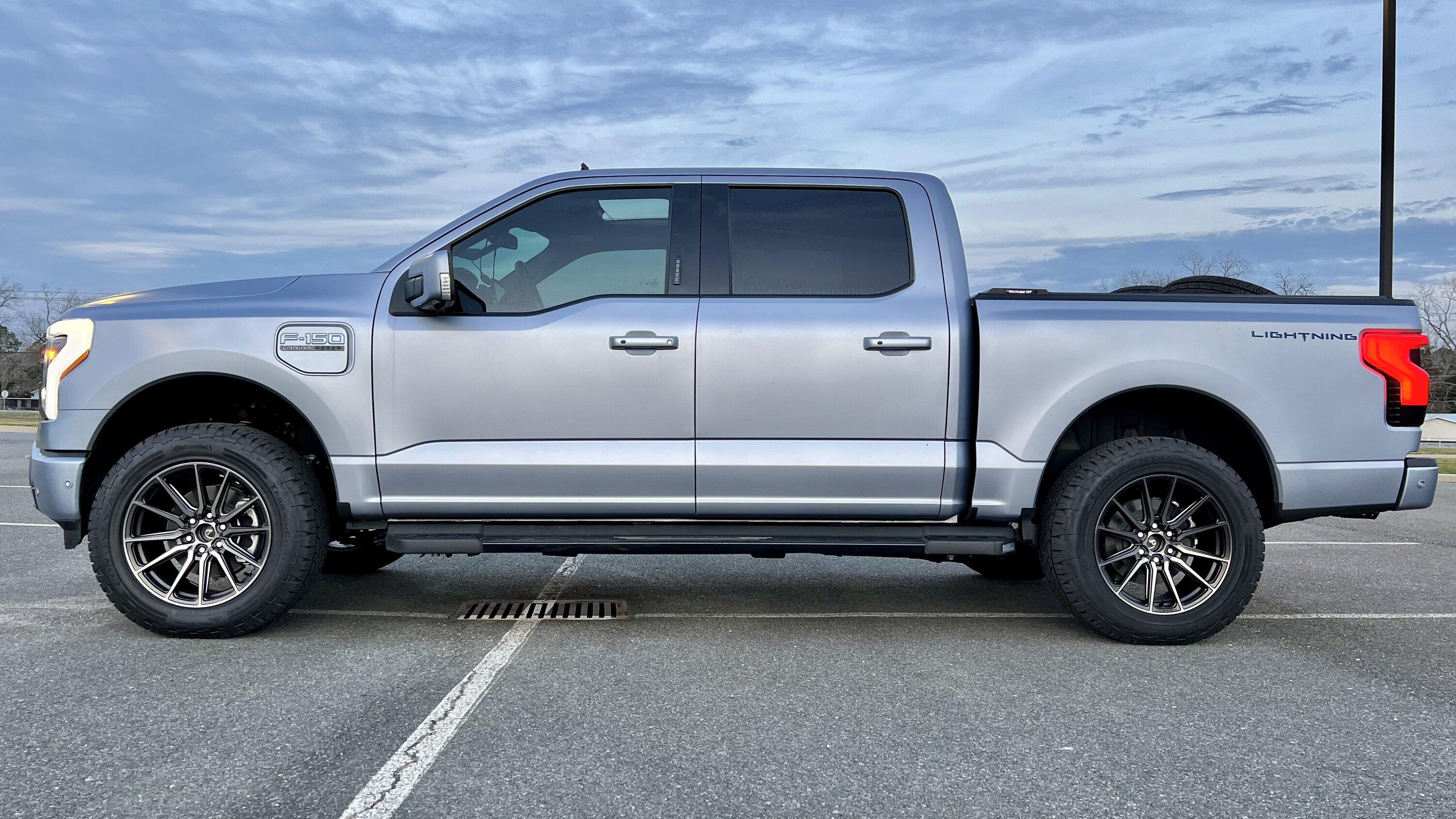 Ford F-150 Lightning Iced Blue Silver Lightning Build. Mods: PPF matte finish, Line-X, gloss black painted grille, black wrapped roof, wheels IMG_4126