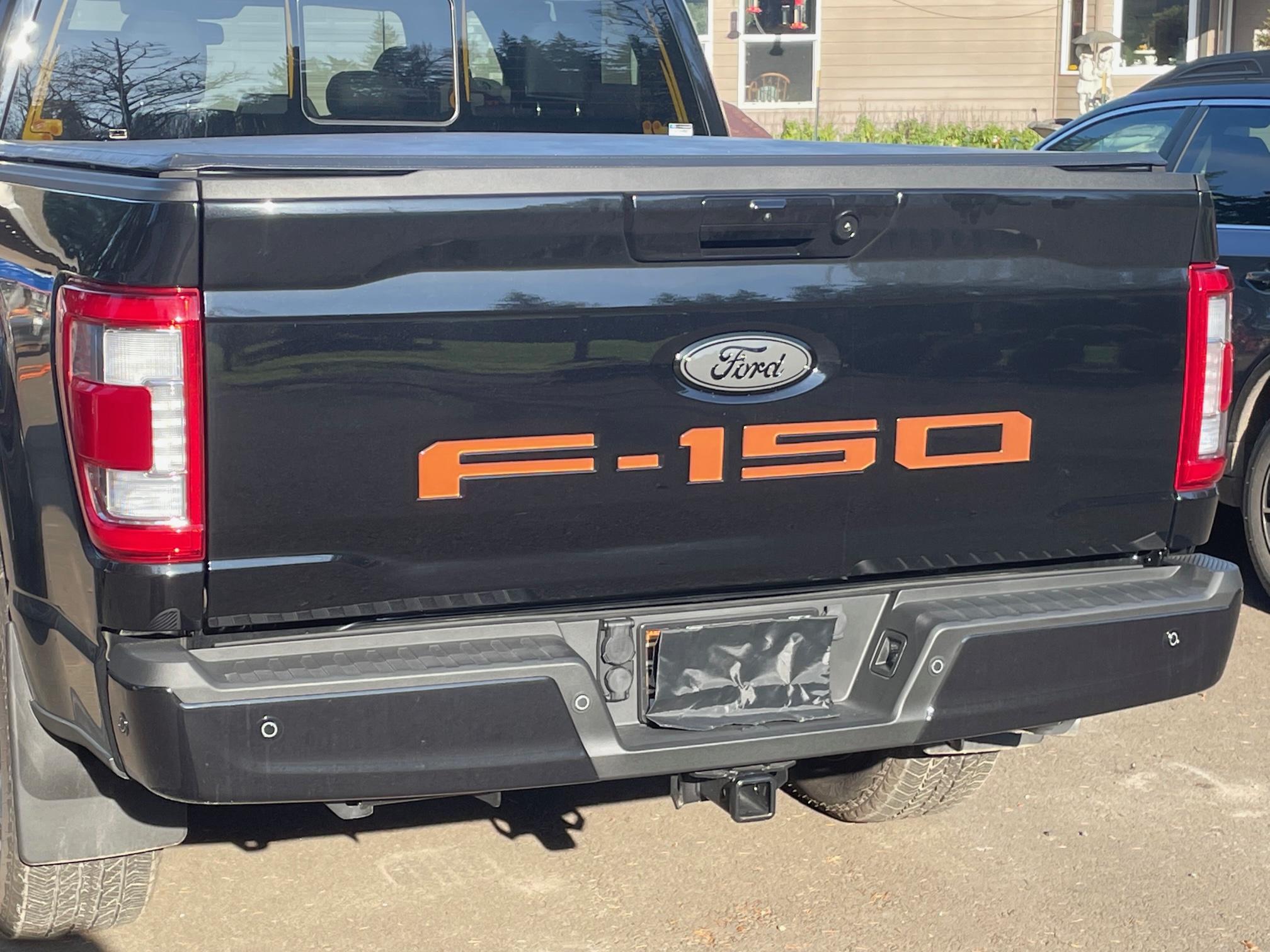 Ford F-150 Lightning Front and rear emblems to match Leadfoot color? IMG_5443