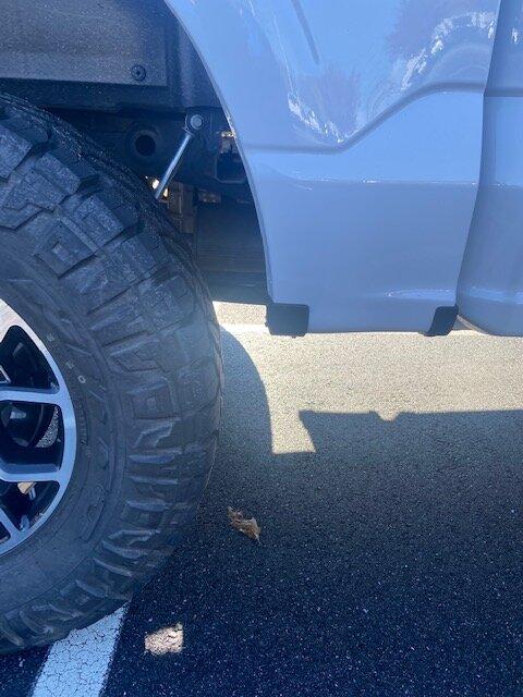 Ford F-150 Lightning Swapping out Rear Wheel Stone Deflector... IMG_5545