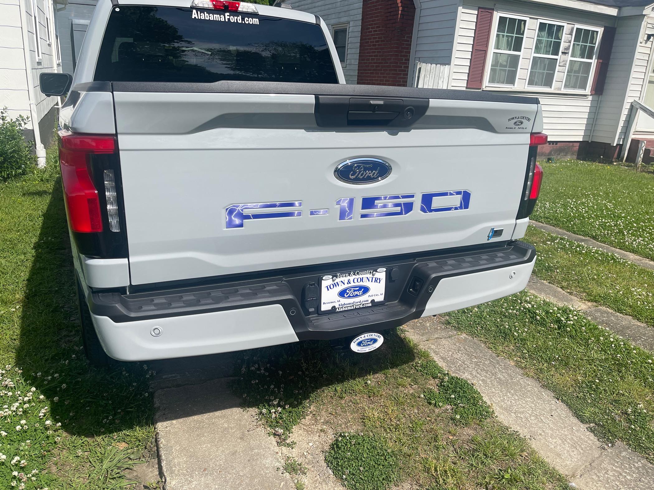 Ford F-150 Lightning Tailgate and charge port lettering IMG_7254