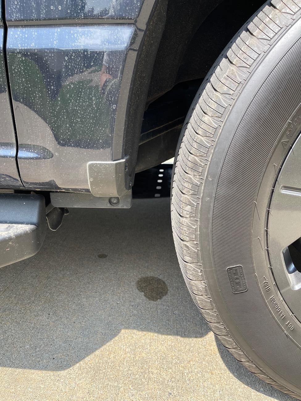 Ford F-150 Lightning Fluid leaking by front passenger tire IMG_8960