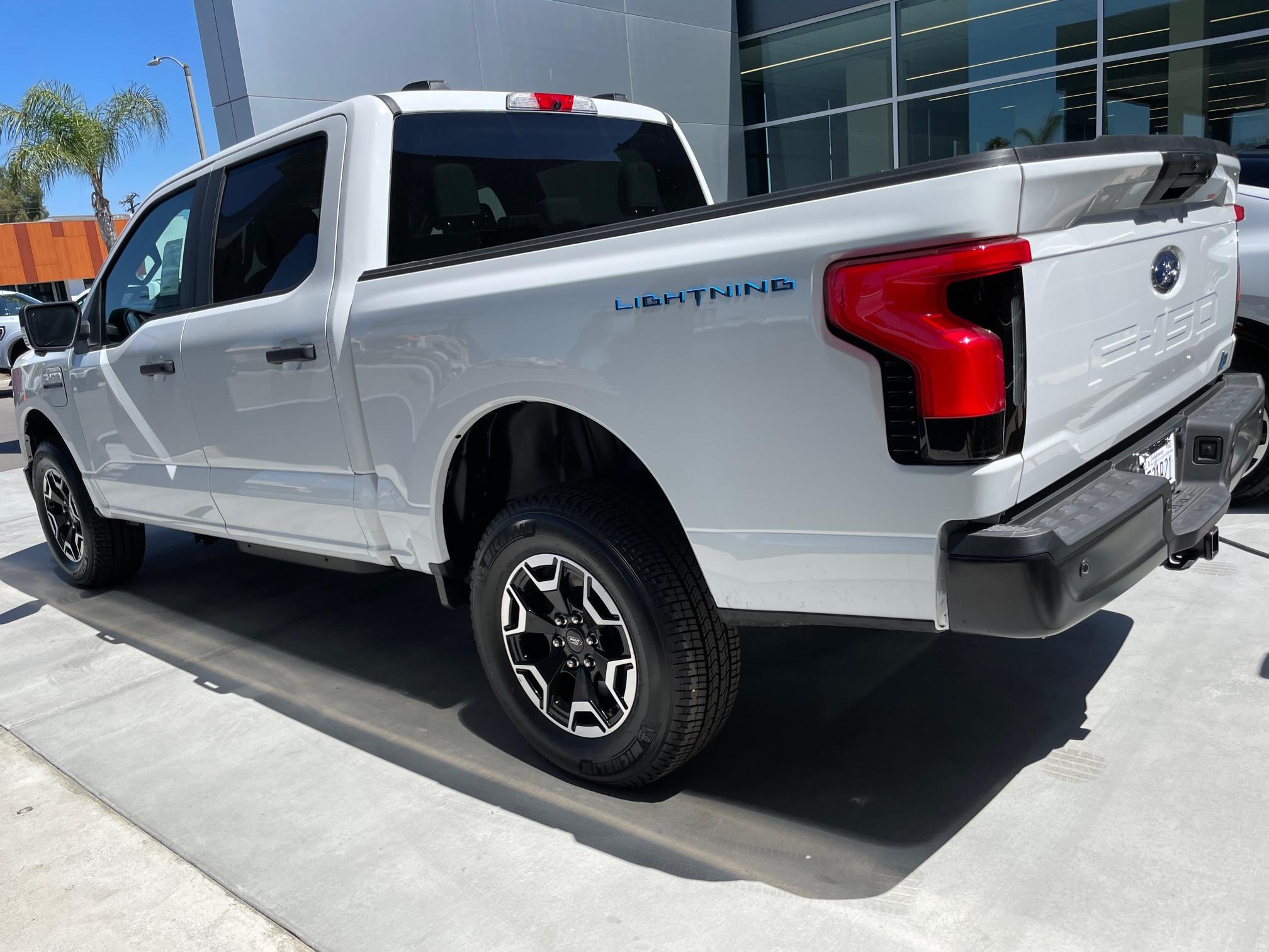 Ford F-150 Lightning Dealer Forgot to Remove Rear Shipping Spacers IMG_9256.JPG