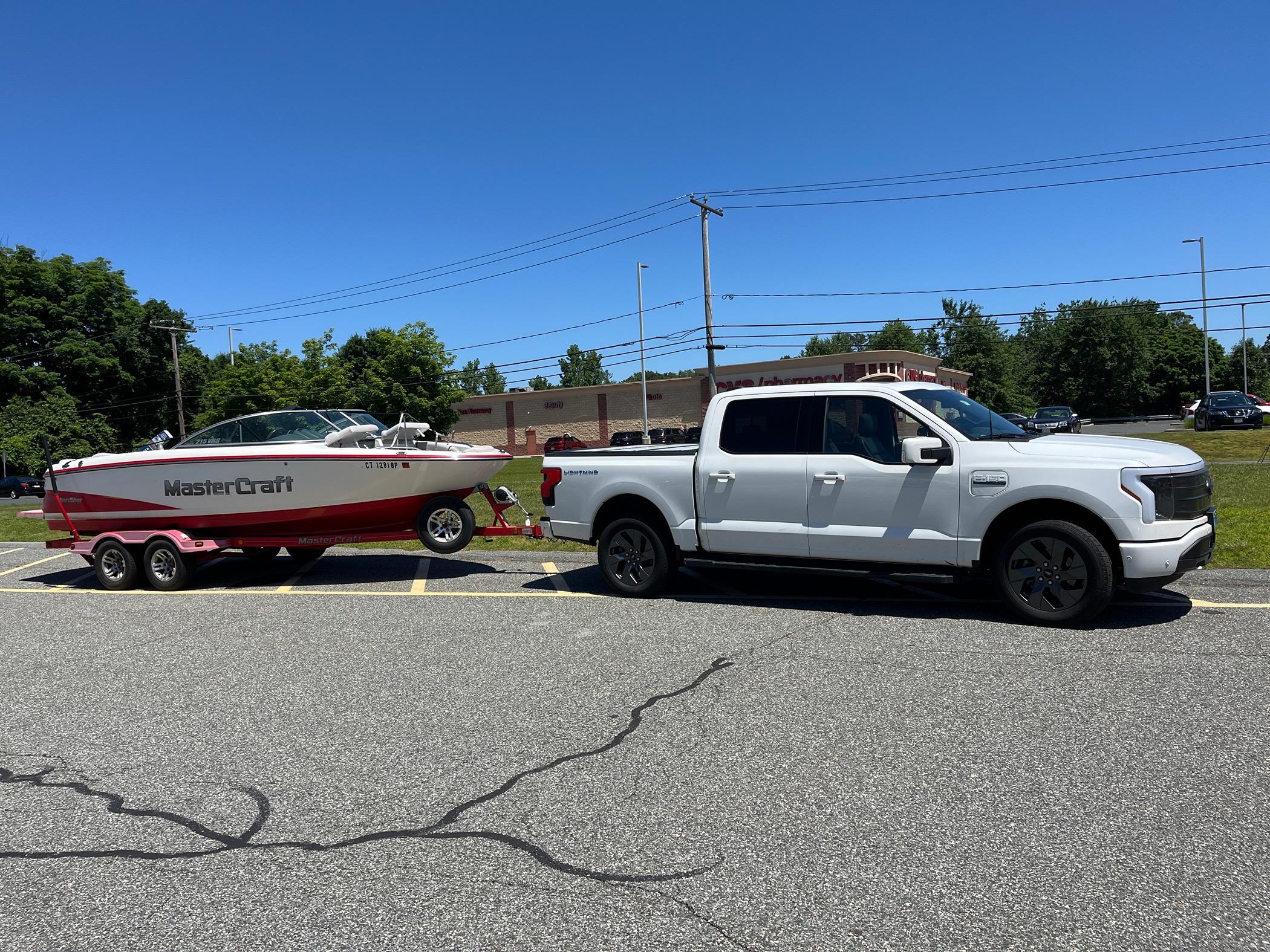 Ford F-150 Lightning Towing a 5,500 lbs boat without Max Tow... it's been great! IMG_9852