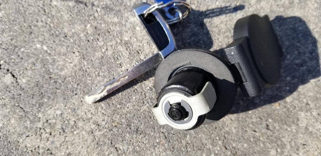 Ford F-150 Lightning Installed a new OEM lock mated to work with my truck's fob key to protect my full-use spare OEM wheel. ire-lock-with-center-cut-key-the-underbody-end-