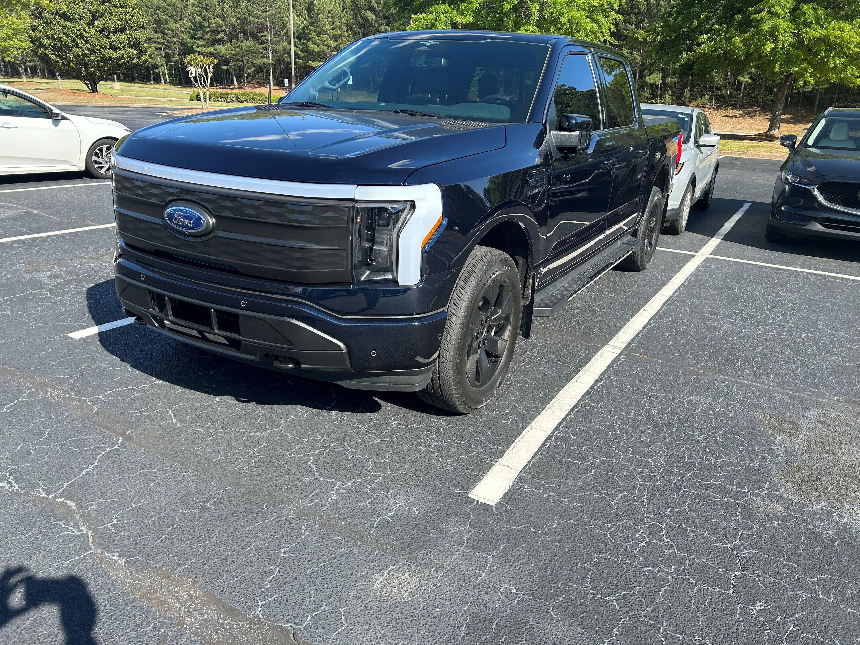 Ford F-150 Lightning How to Remove 2023 F-150 Lightning Front Grille in 4 Easy Steps Lightning black