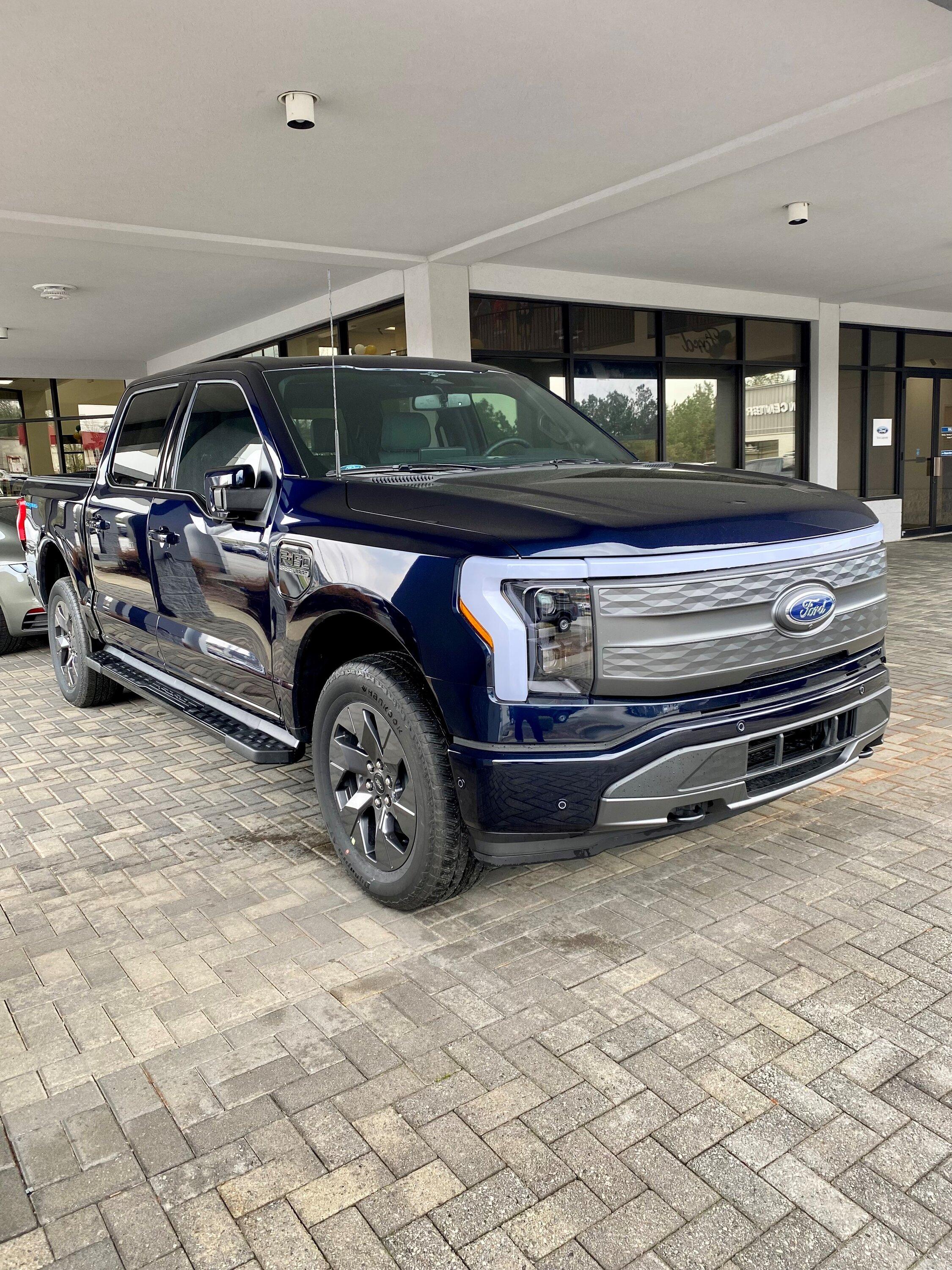 Ford F-150 Lightning How to Remove 2023 F-150 Lightning Front Grille in 4 Easy Steps Lightning grey